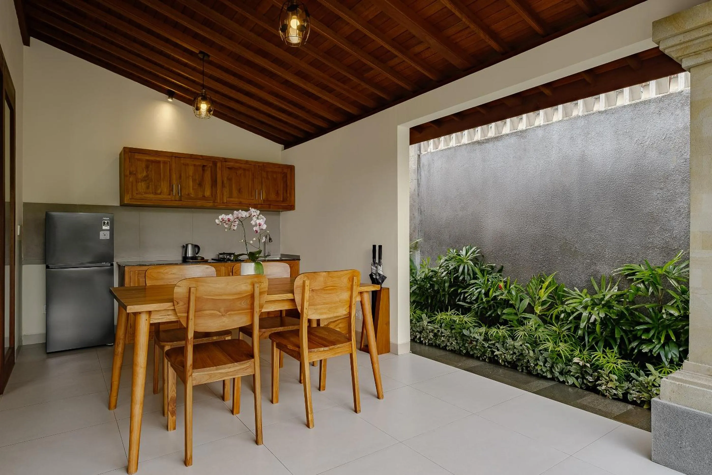 Kitchen or kitchenette in Yanyan Resort Ubud