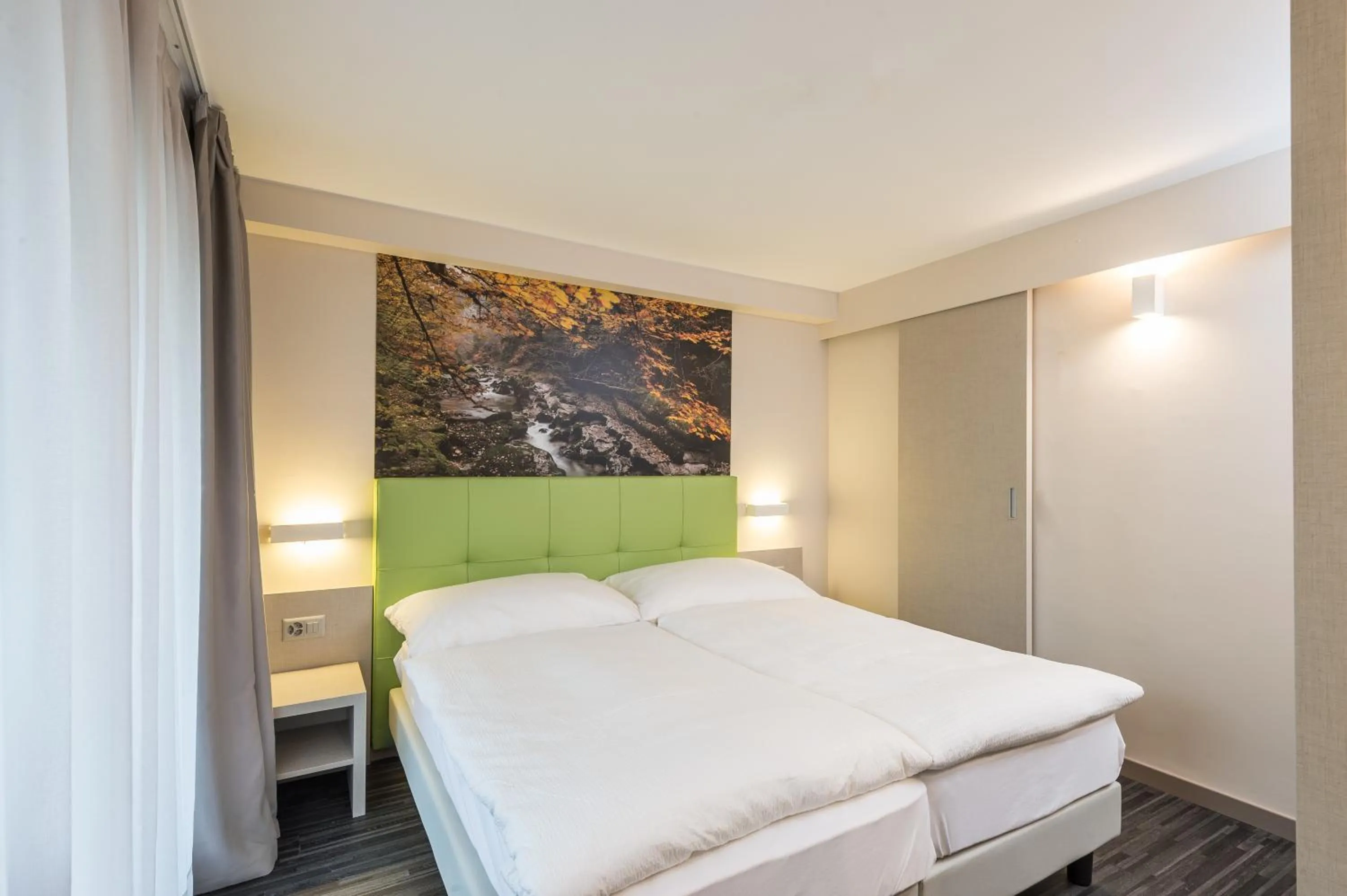 Photo of the whole room, Bed in Adhhoc Hotel