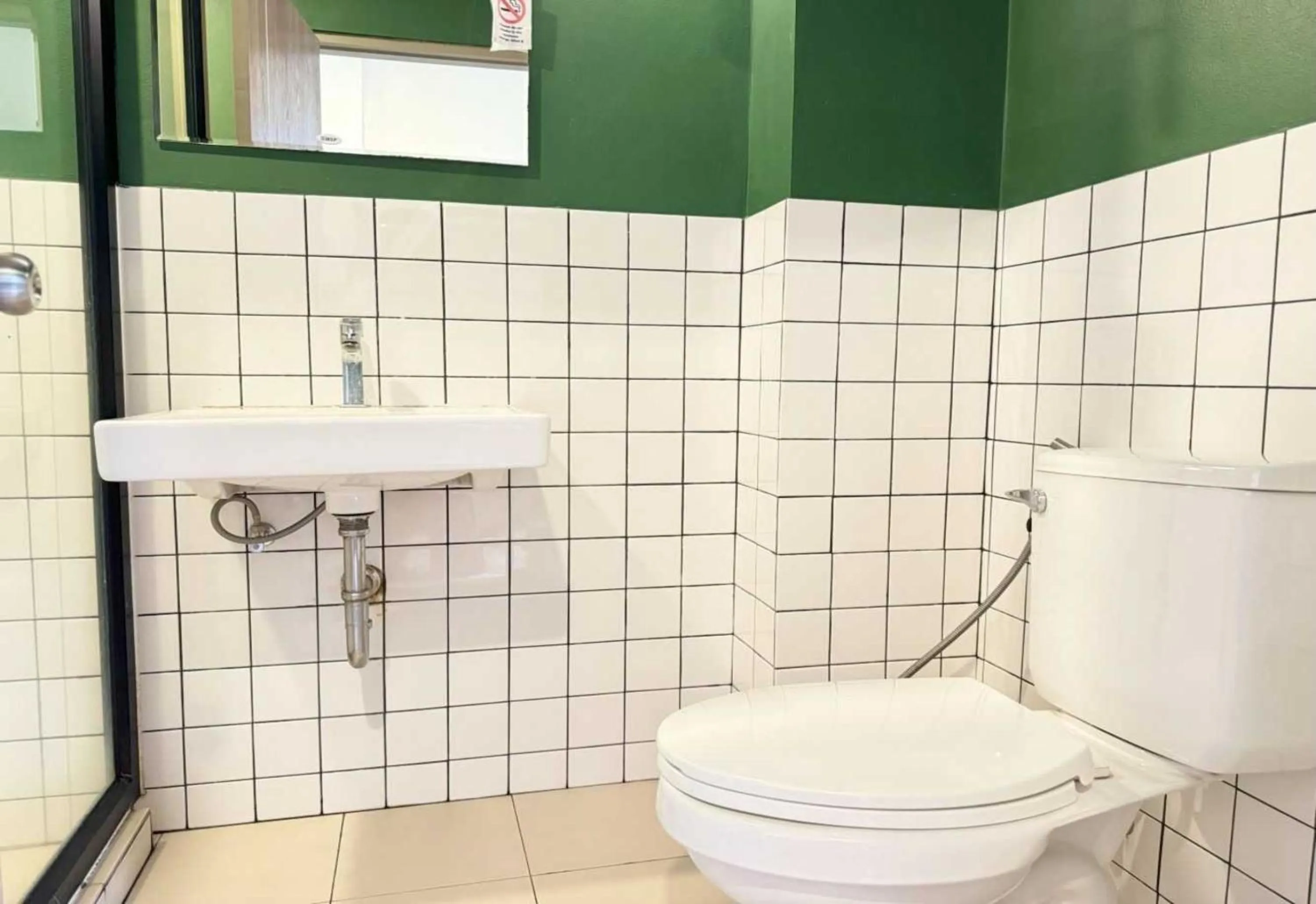 Bathroom in Collection O The Singha Chiangmai Hotel