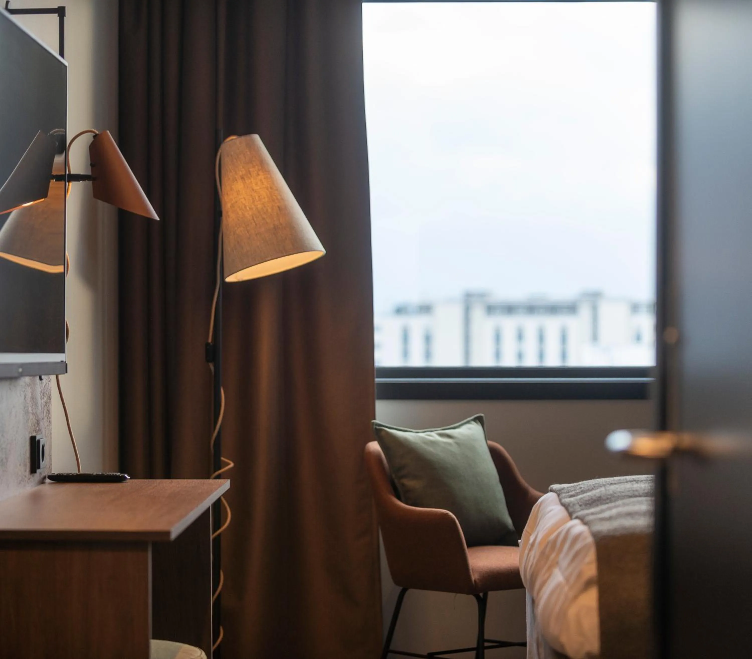 Seating area, Bed in Scandic Sortland