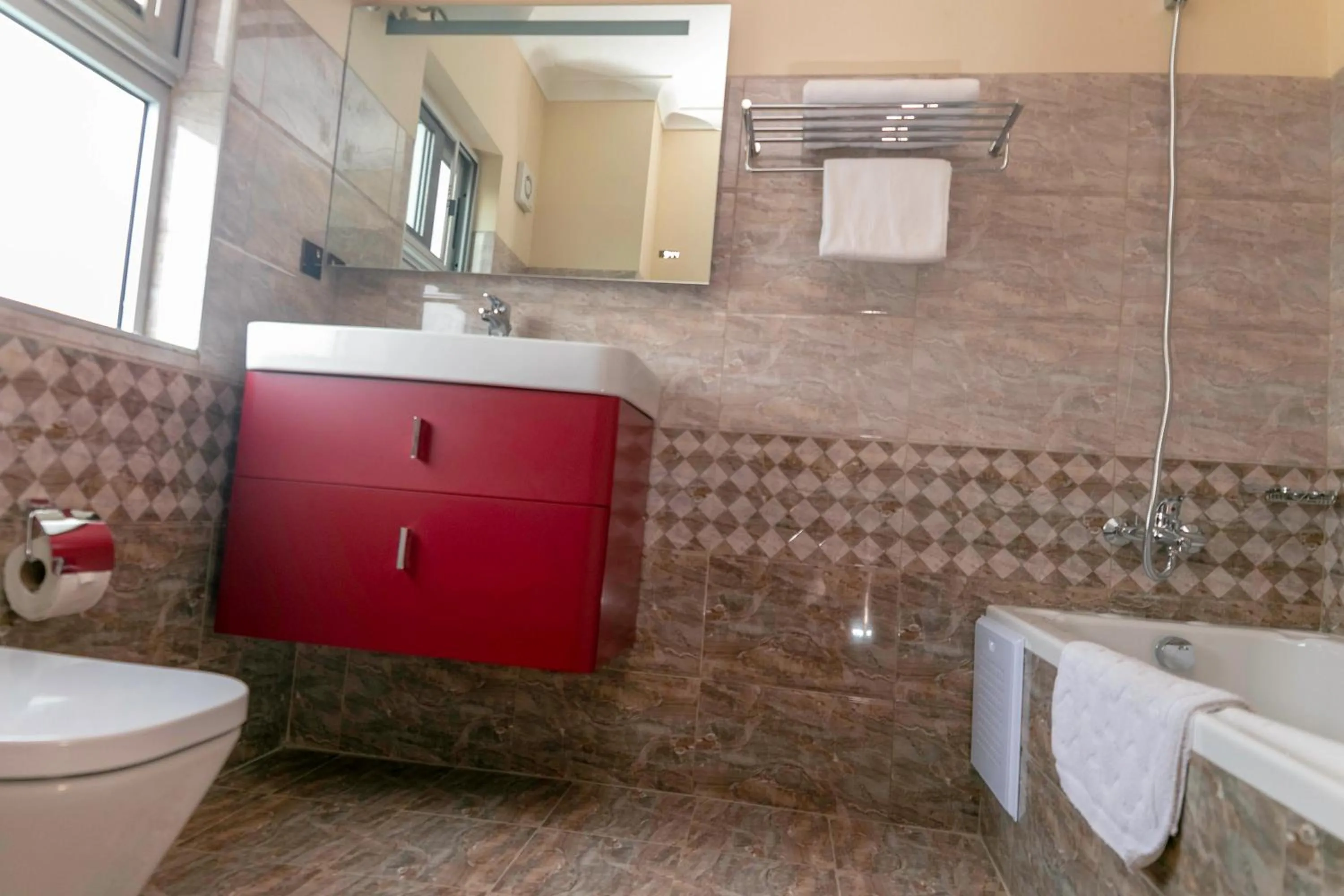 Toilet in Monarch Hotel