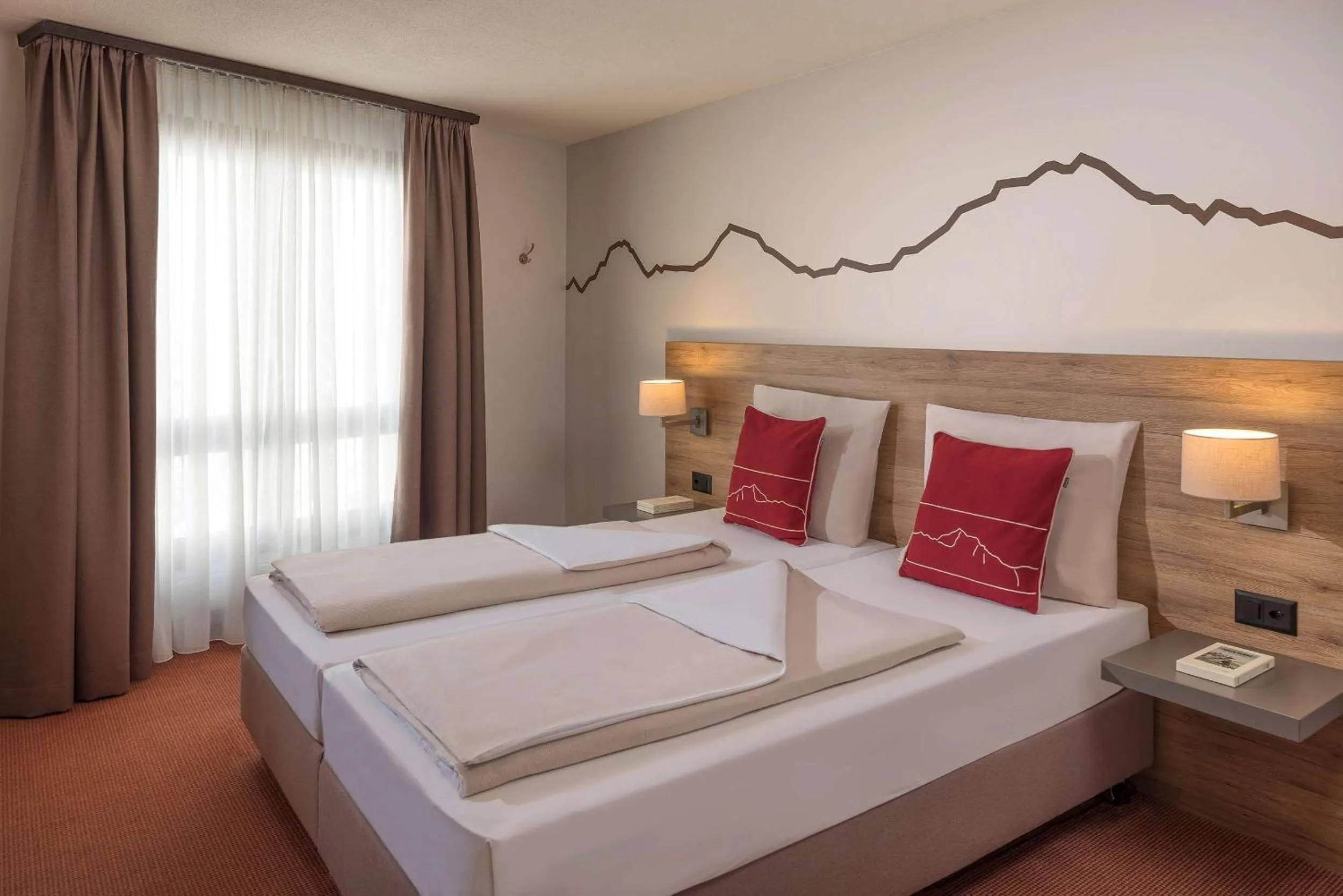 Photo of the whole room, Bed in Dorint Blüemlisalp Beatenberg/Interlaken