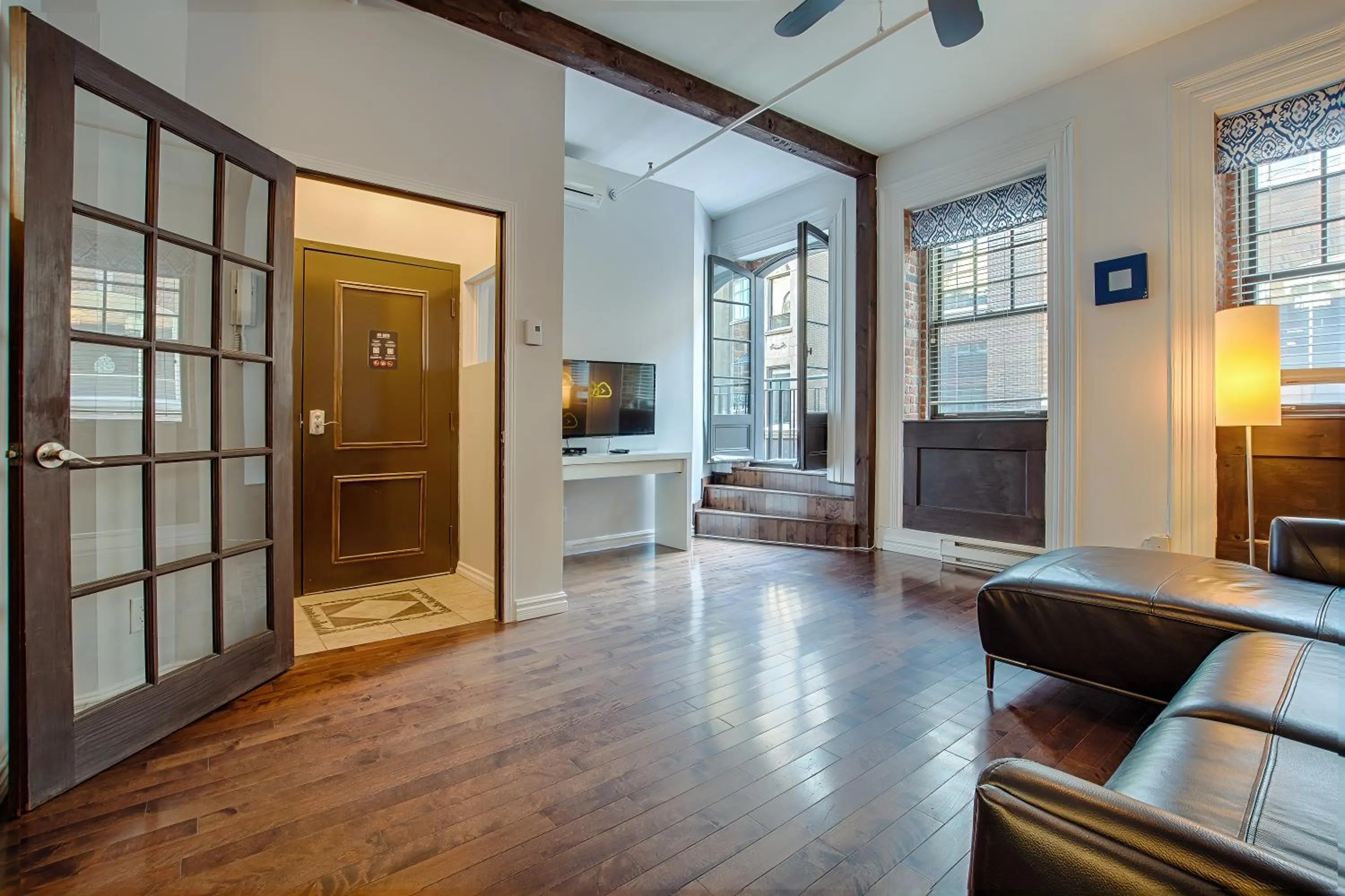 Communal lounge/ TV room in Les Lofts St-Jo - Par Les Lofts Vieux-Québec