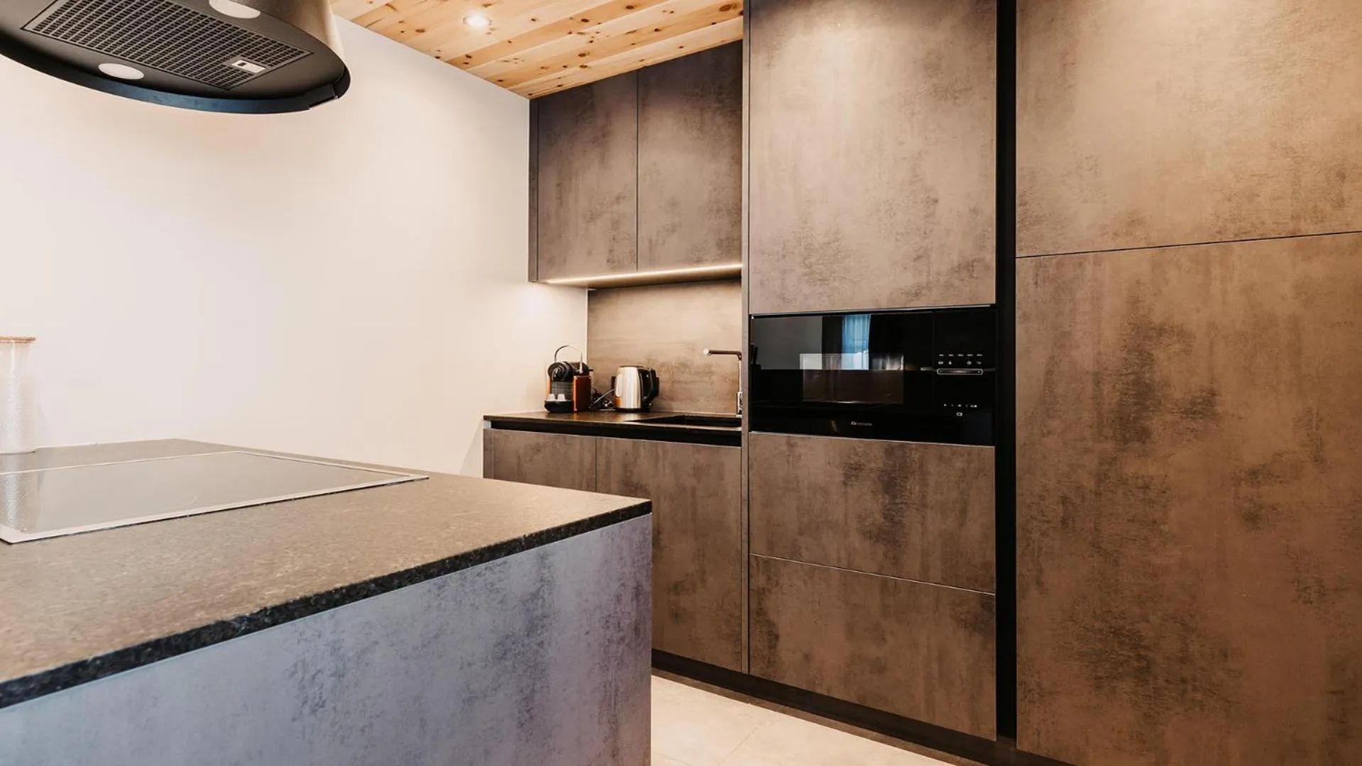 Kitchen or kitchenette in Hofgut Apartment & Lifestyle Resort Wagrain