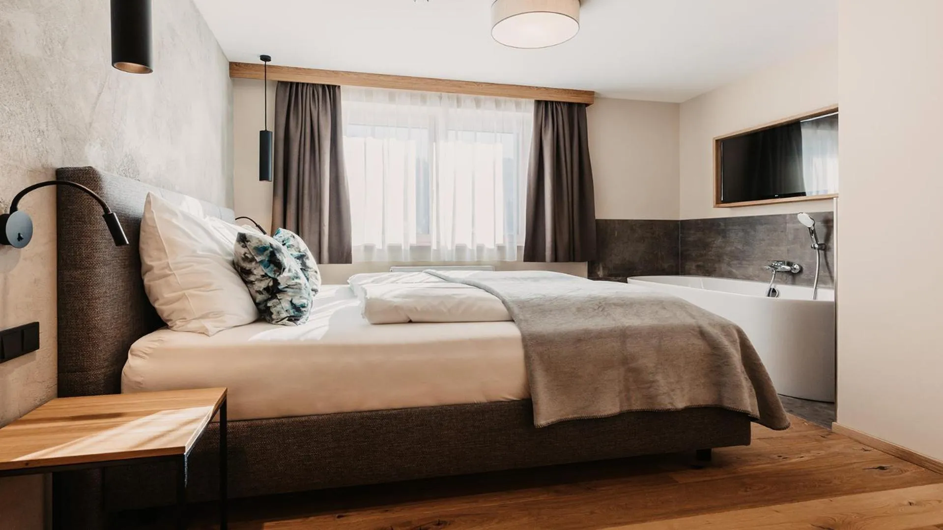 Bed in Hofgut Apartment & Lifestyle Resort Wagrain