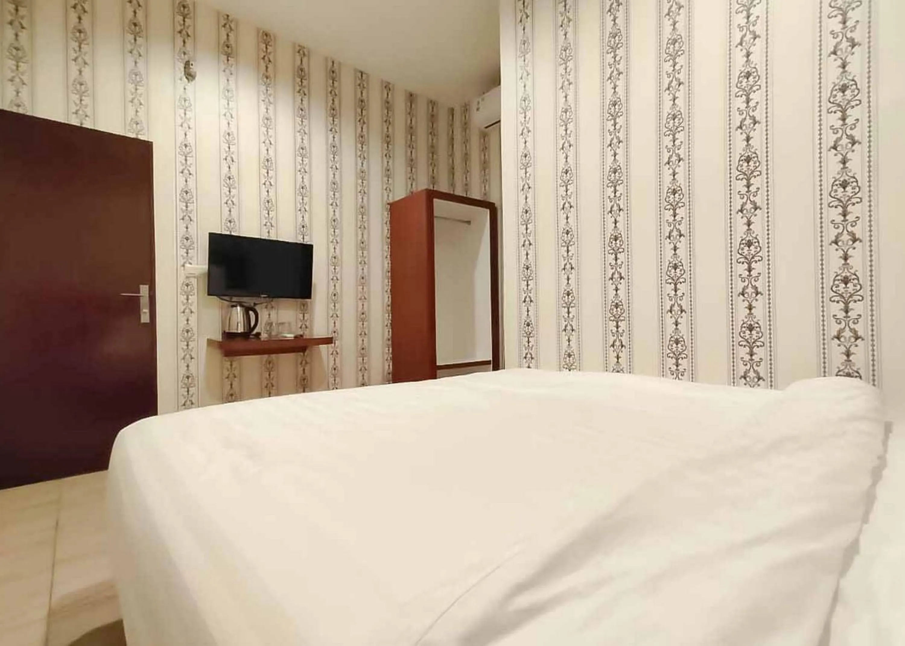 Bed in RedDoorz Plus @ Jalan Letda Sujono Medan 2