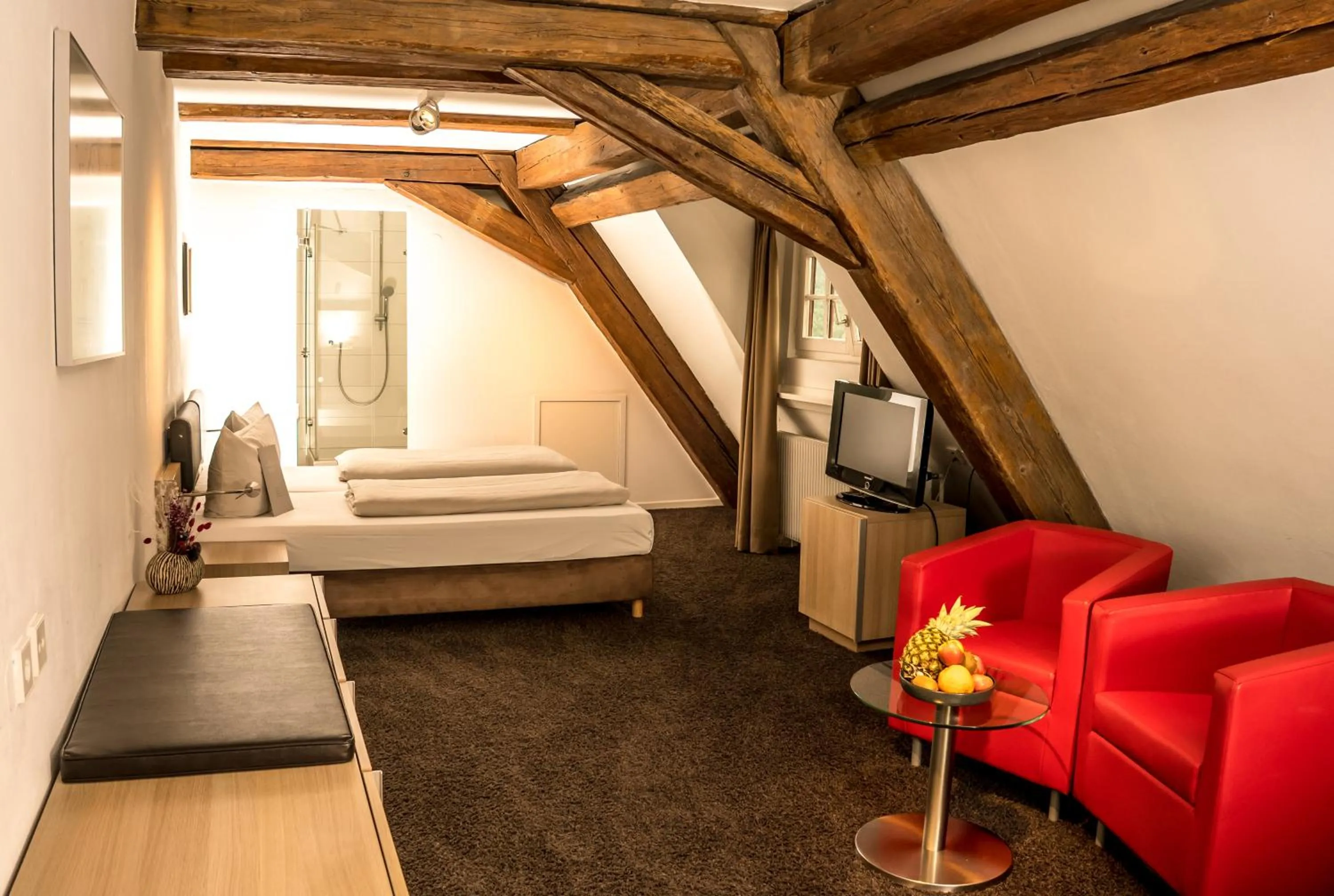 Photo of the whole room, Bed in Hotel Hofgut Hohenkarpfen