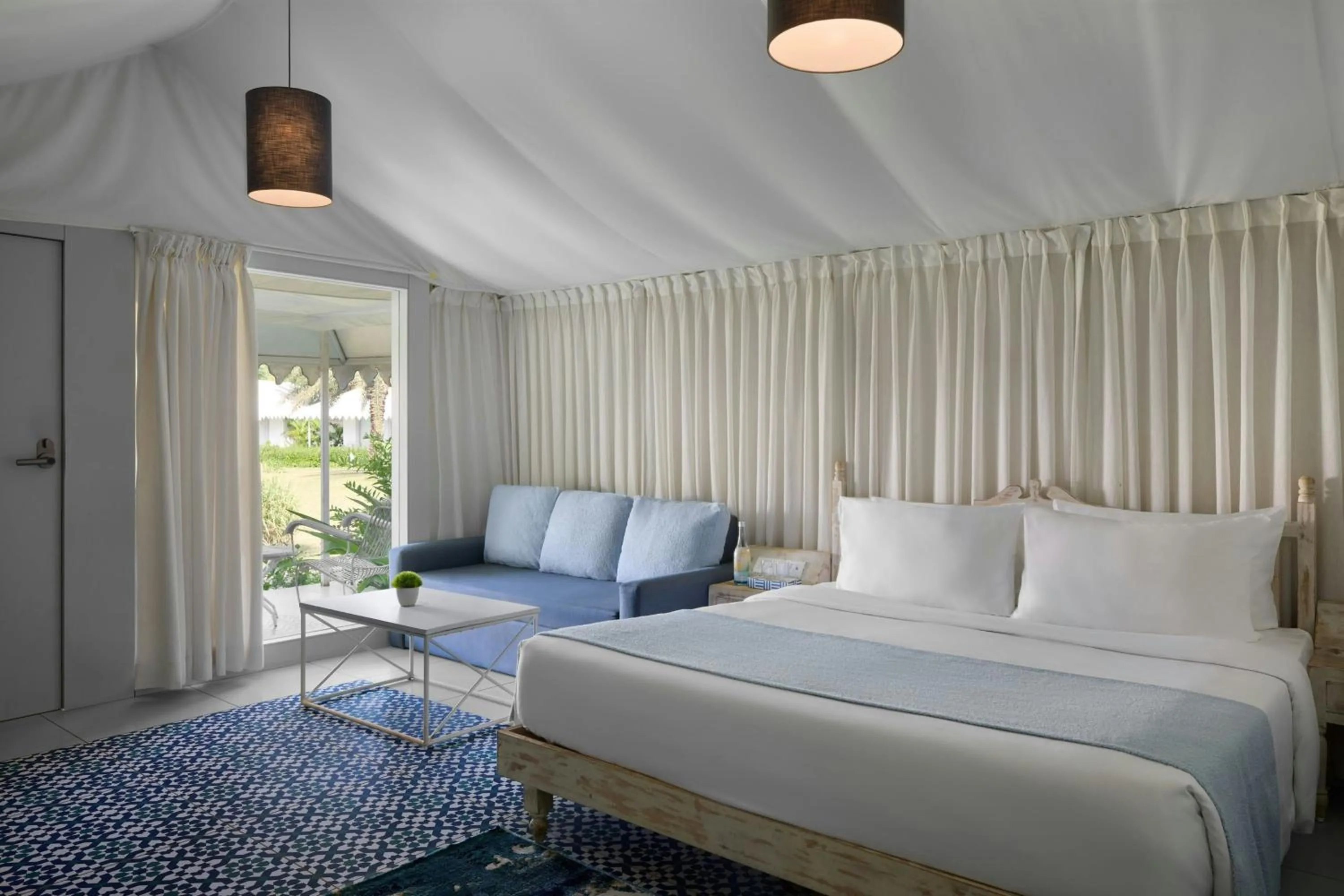 Photo of the whole room, Bed in The Fern Seaside Luxurious Tent Resort Daman, Series by Marriott