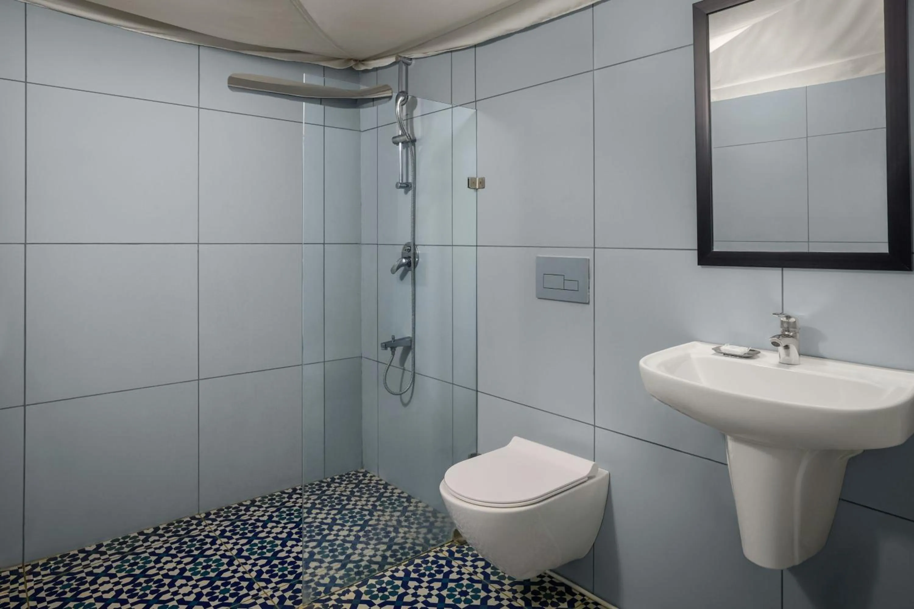 Bathroom in The Fern Seaside Luxurious Tent Resort Daman, Series by Marriott