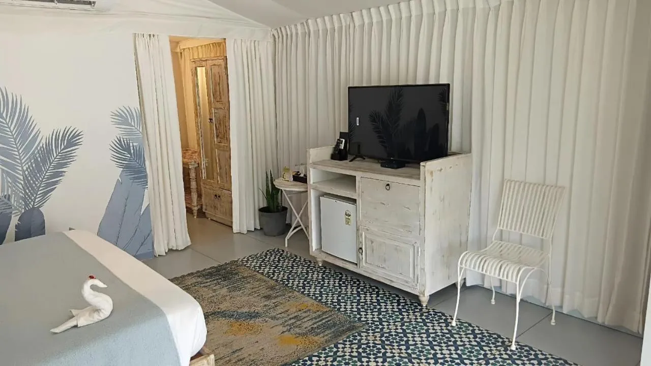 TV and multimedia in The Fern Seaside Luxurious Tent Resort Daman, Series by Marriott