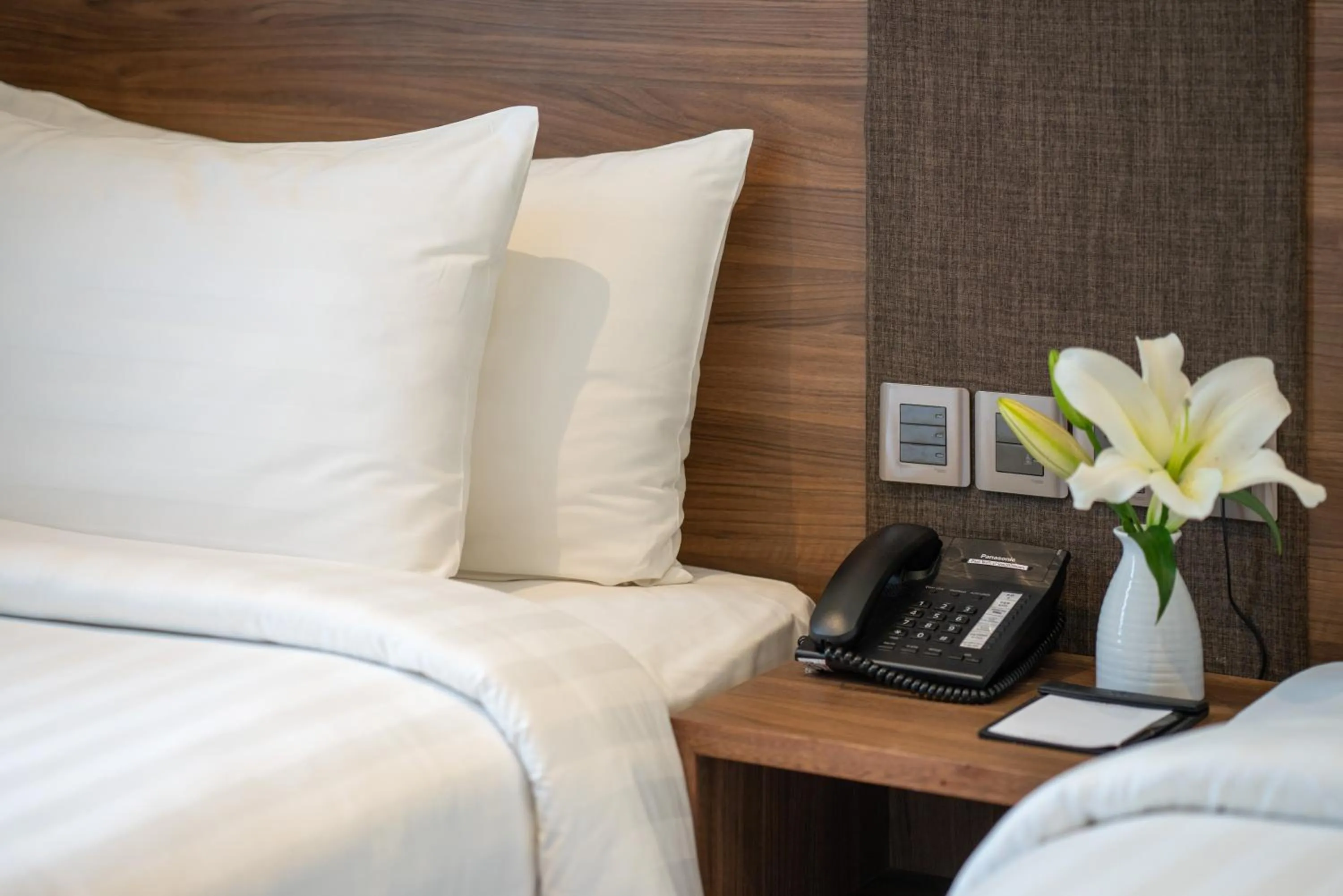 Bed in Northern Charm Hotel