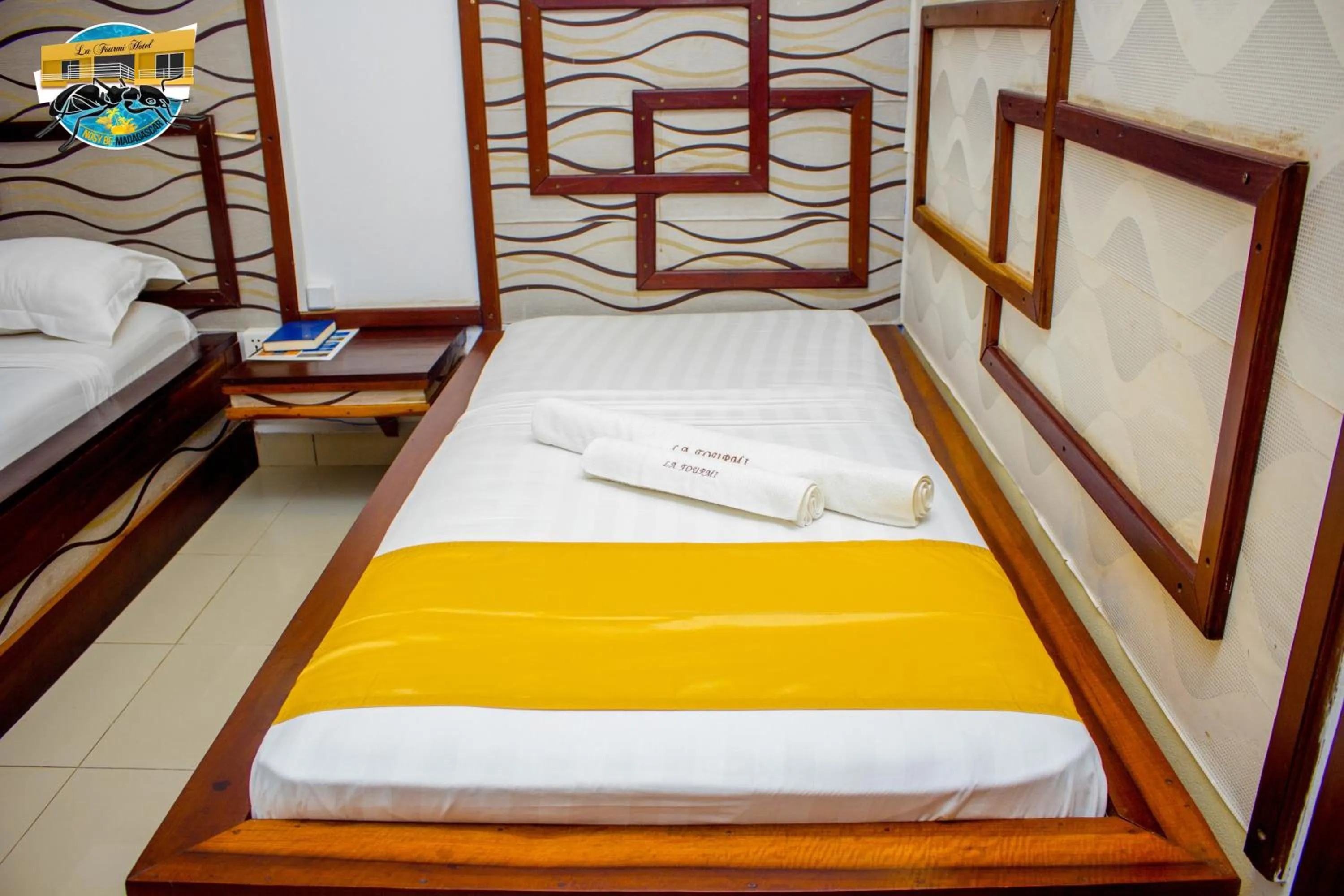 Bed in La Fourmi Hotel