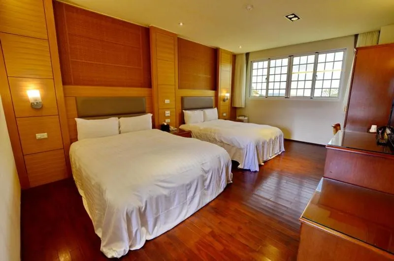 Bed in Jun Yue Hanging Garden Resort
