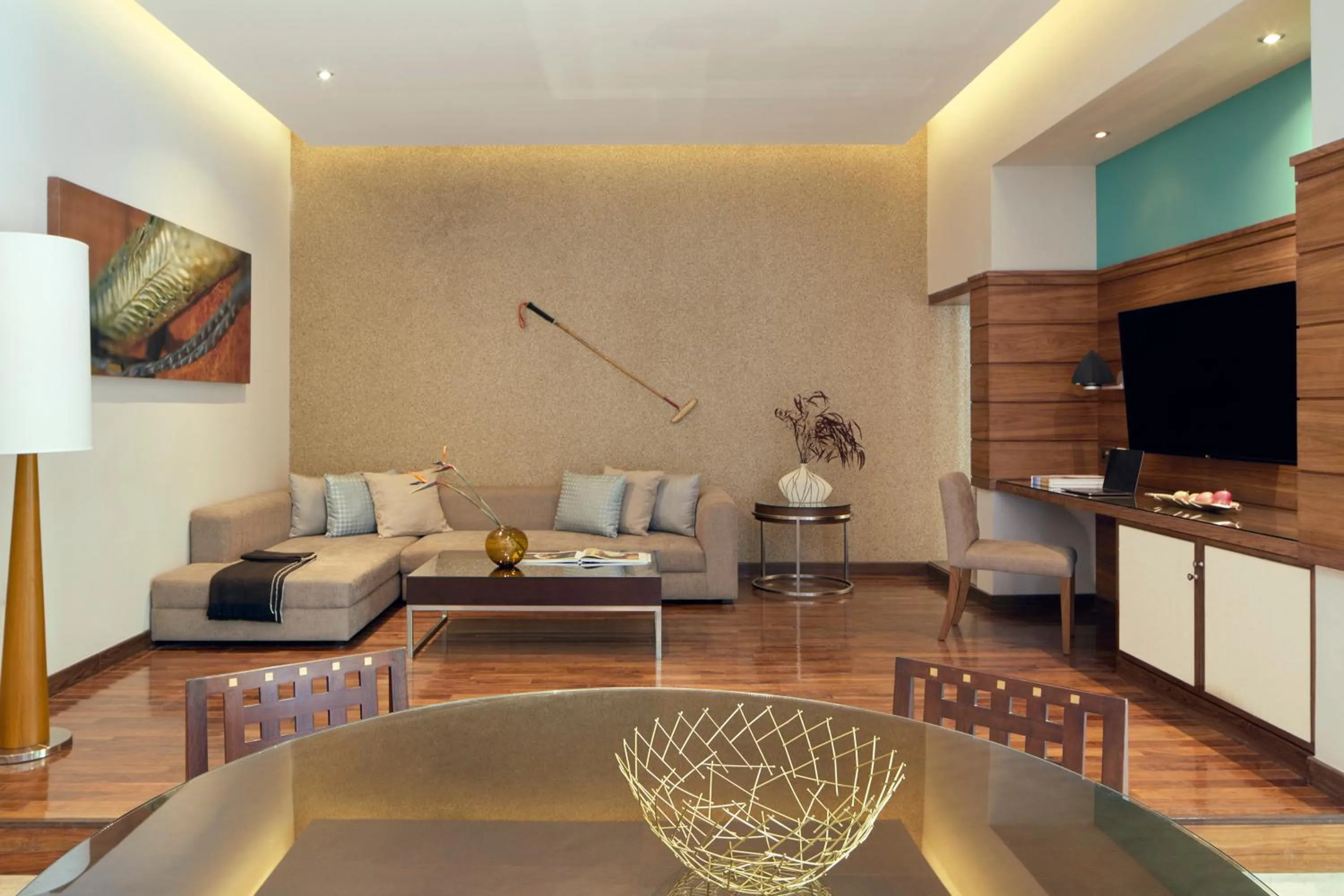 Communal lounge/ TV room in Meliá Desert Palm Member of Meliá Collection