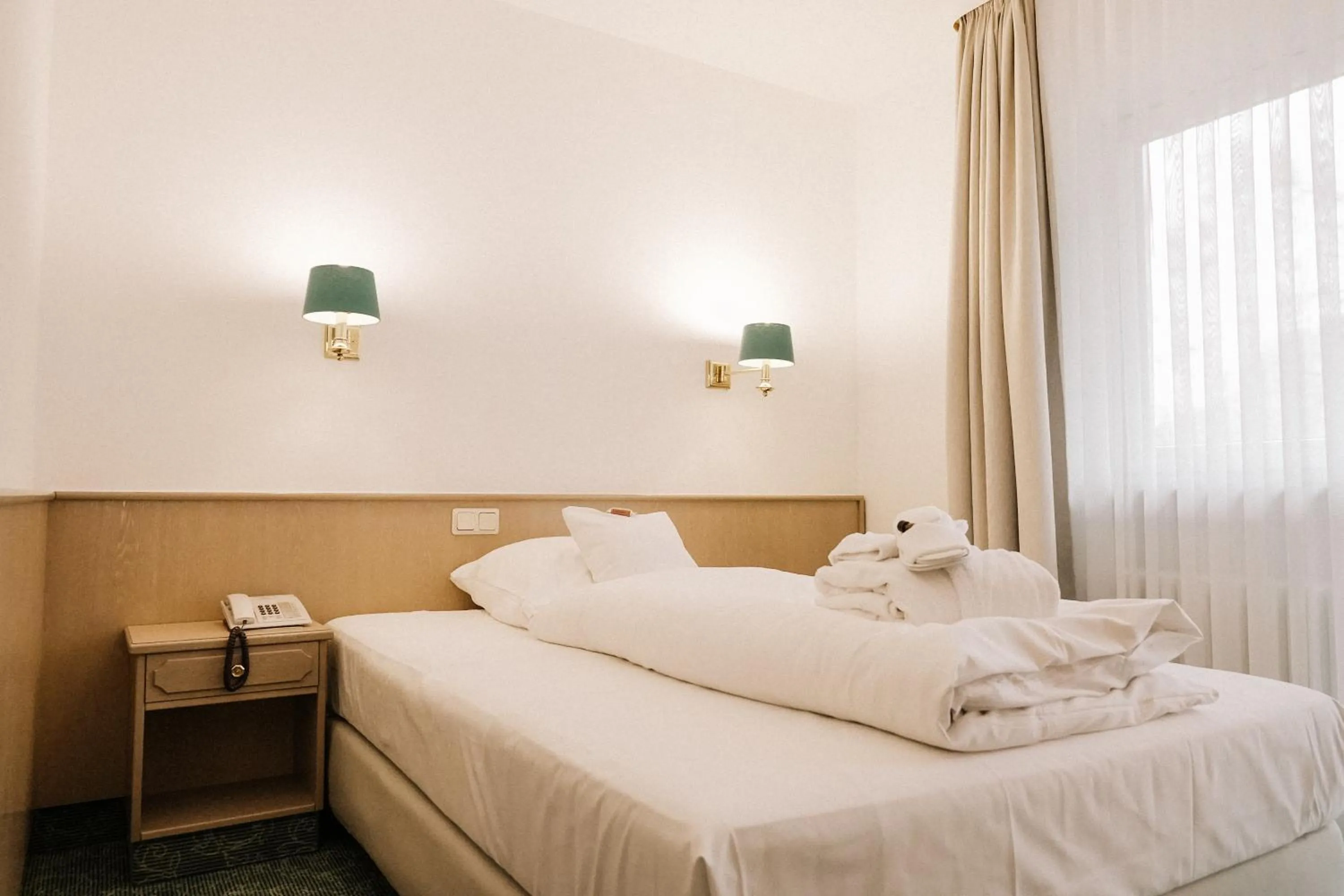 Photo of the whole room, Bed in Landhotel Waldhaus