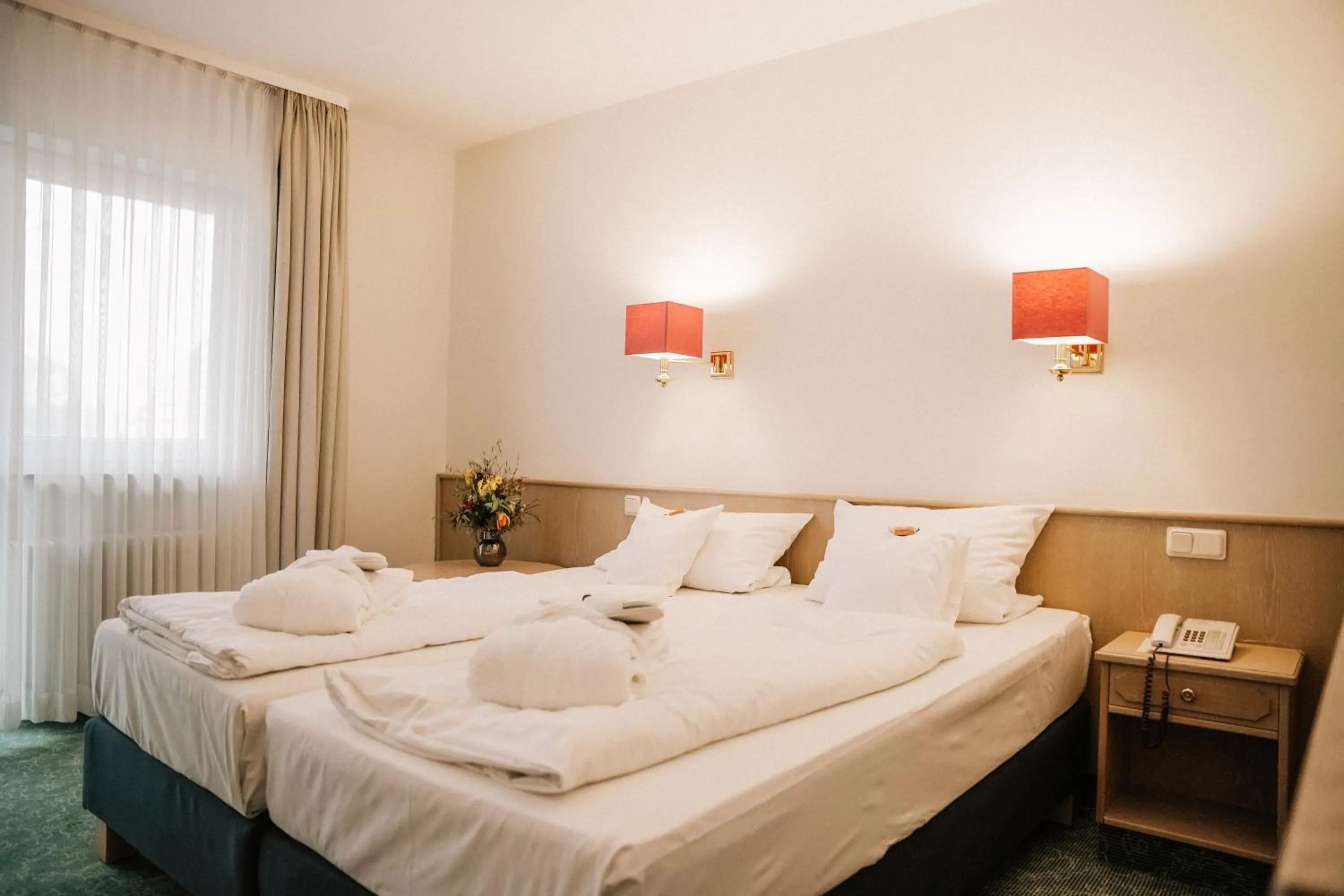 Photo of the whole room, Bed in Landhotel Waldhaus