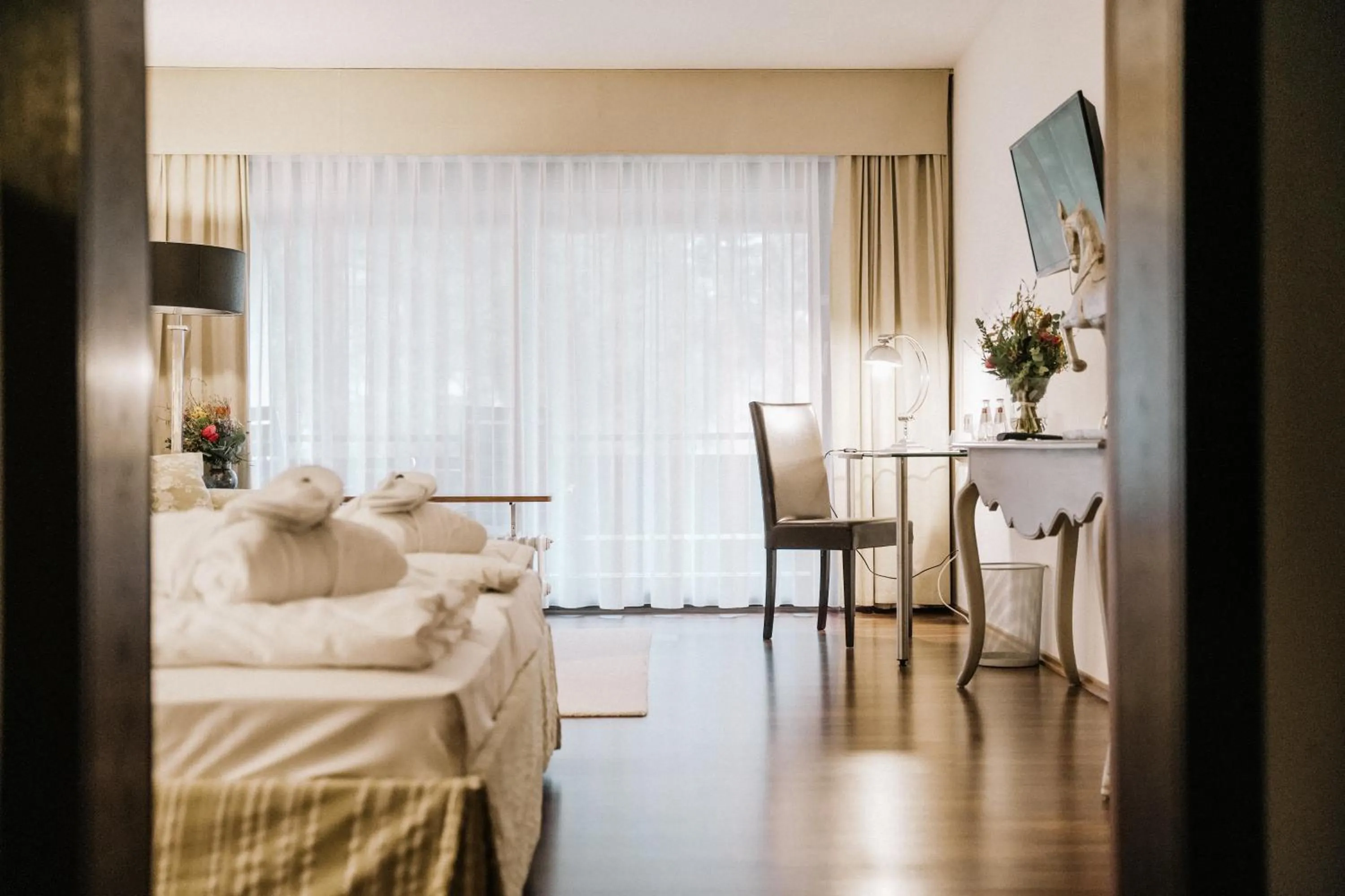 Photo of the whole room, Bed in Landhotel Waldhaus