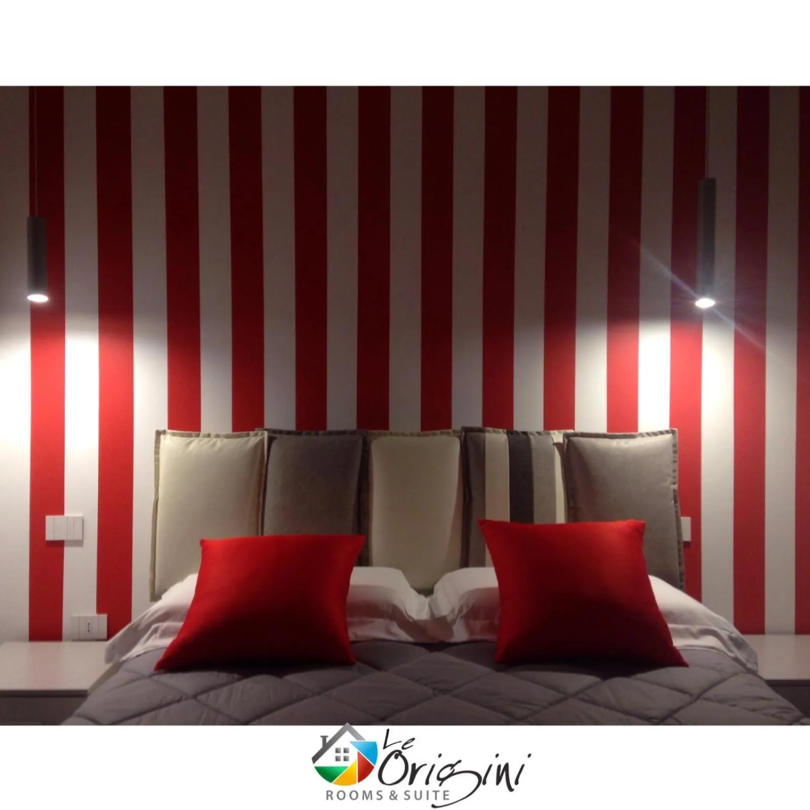 Bed in Le Origini Rooms&Suite