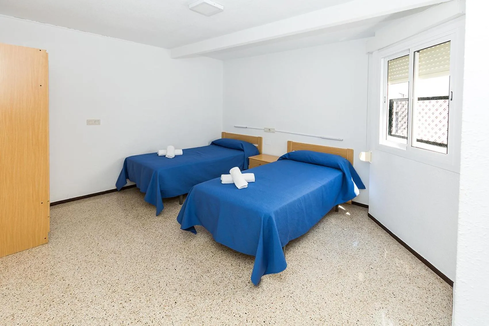 Bed in Hostal El Mercat