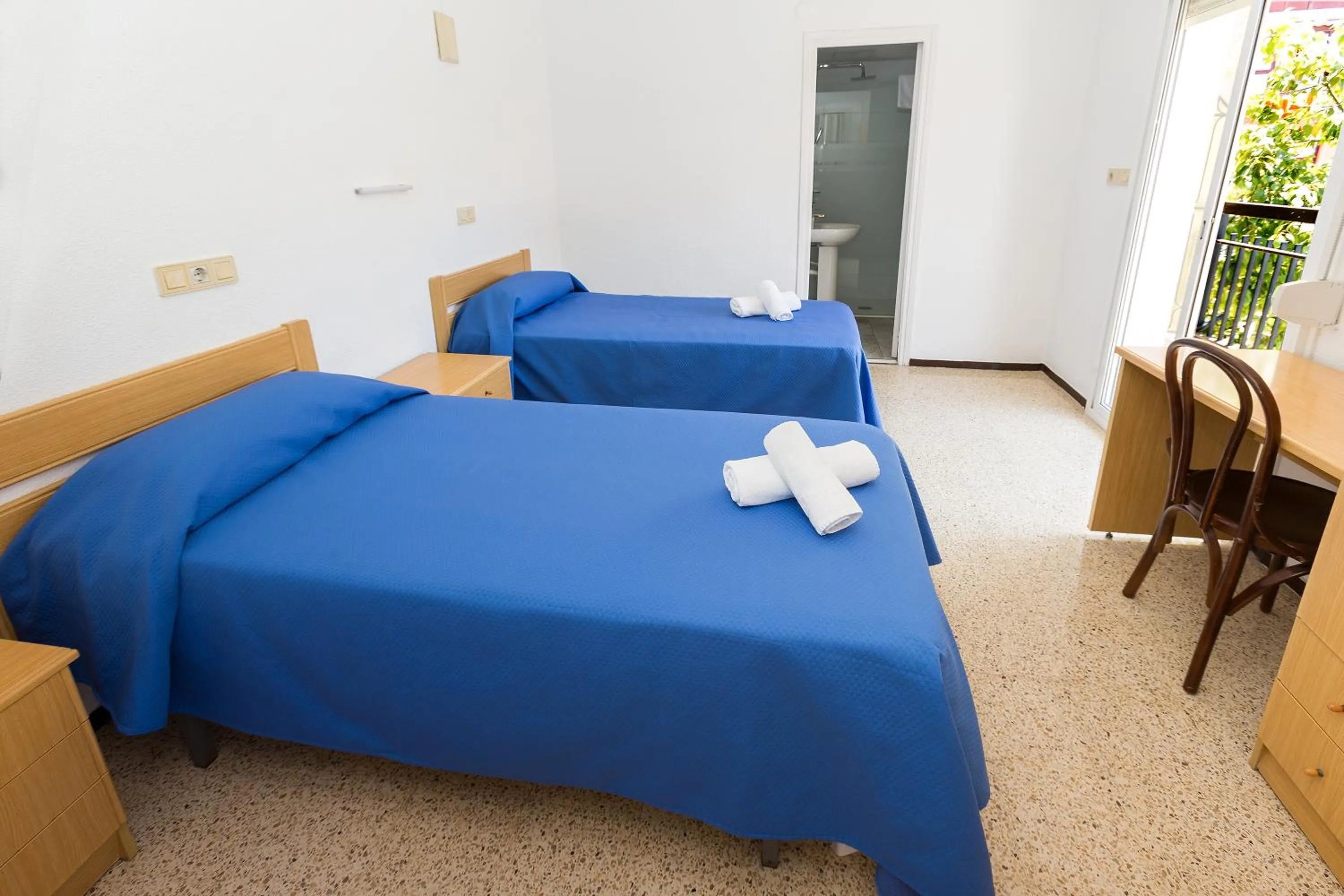 Bed in Hostal El Mercat