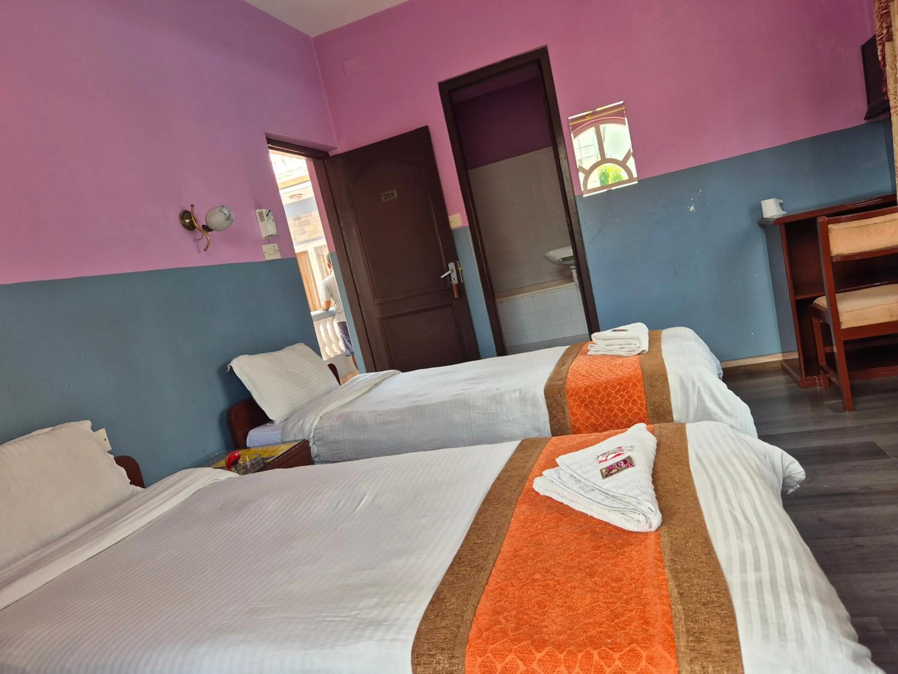 Bed in Hotel Fishtail Villa