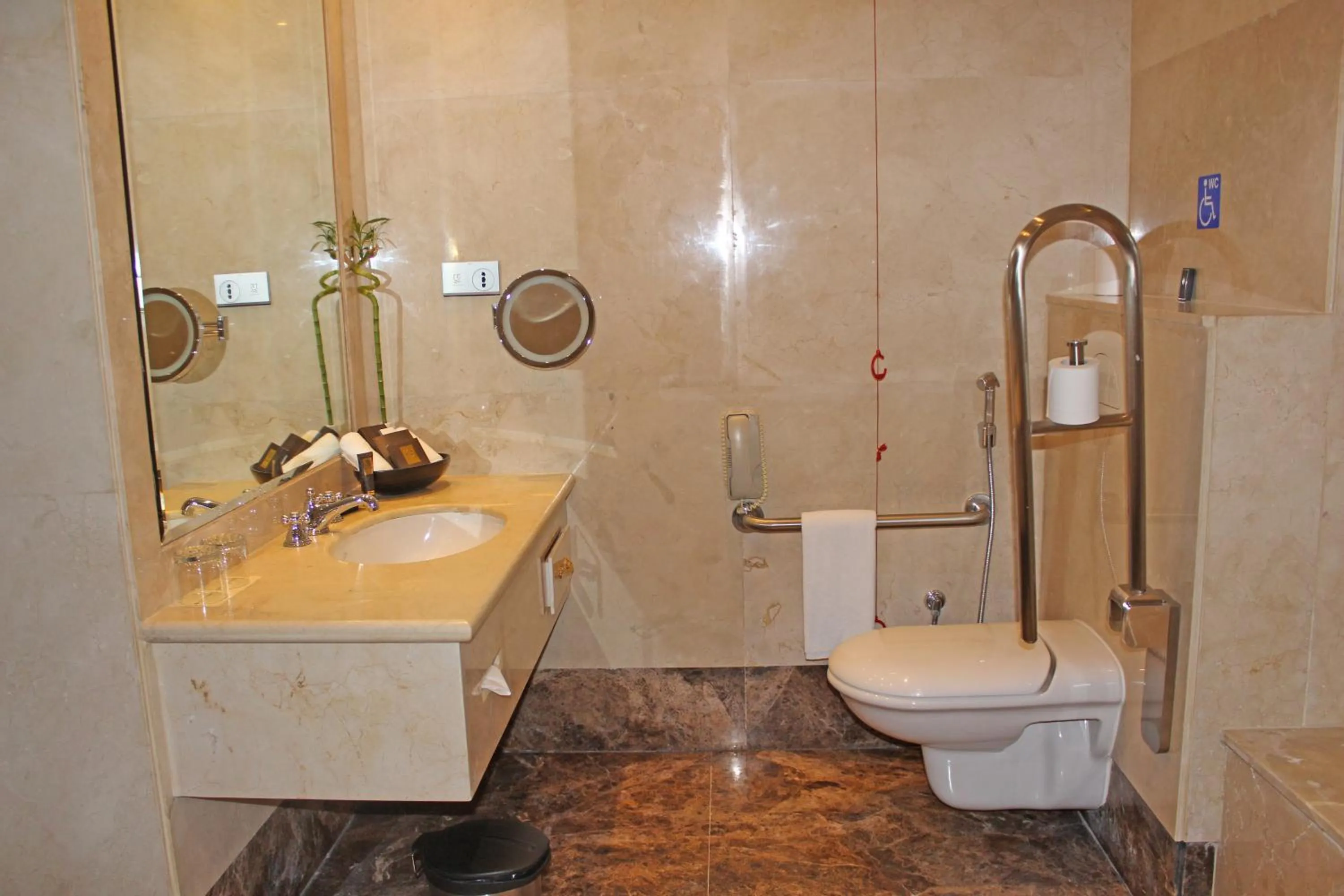 Toilet in Grand Regency Doha, Trademark Collection by Wyndham