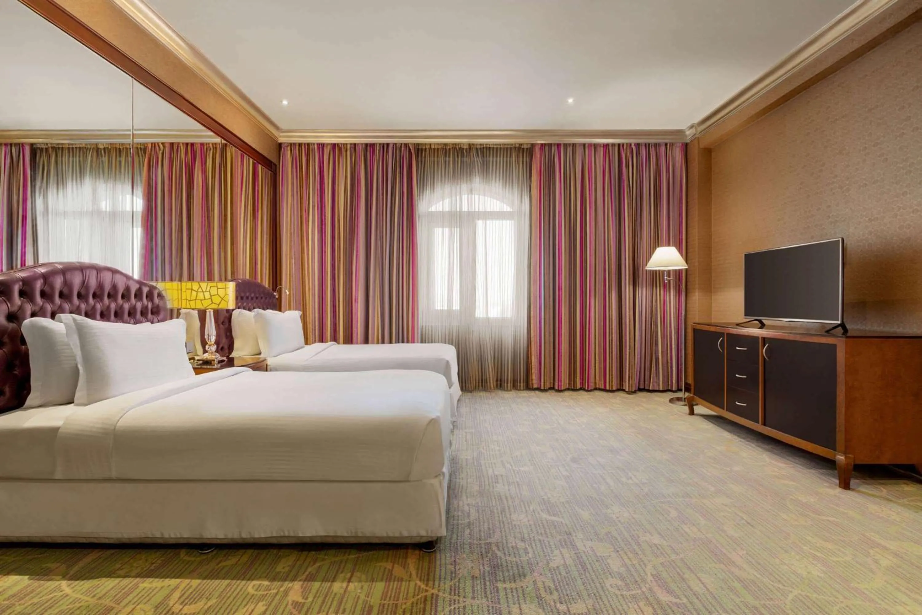 Photo of the whole room, Bed in Grand Regency Doha, Trademark Collection by Wyndham