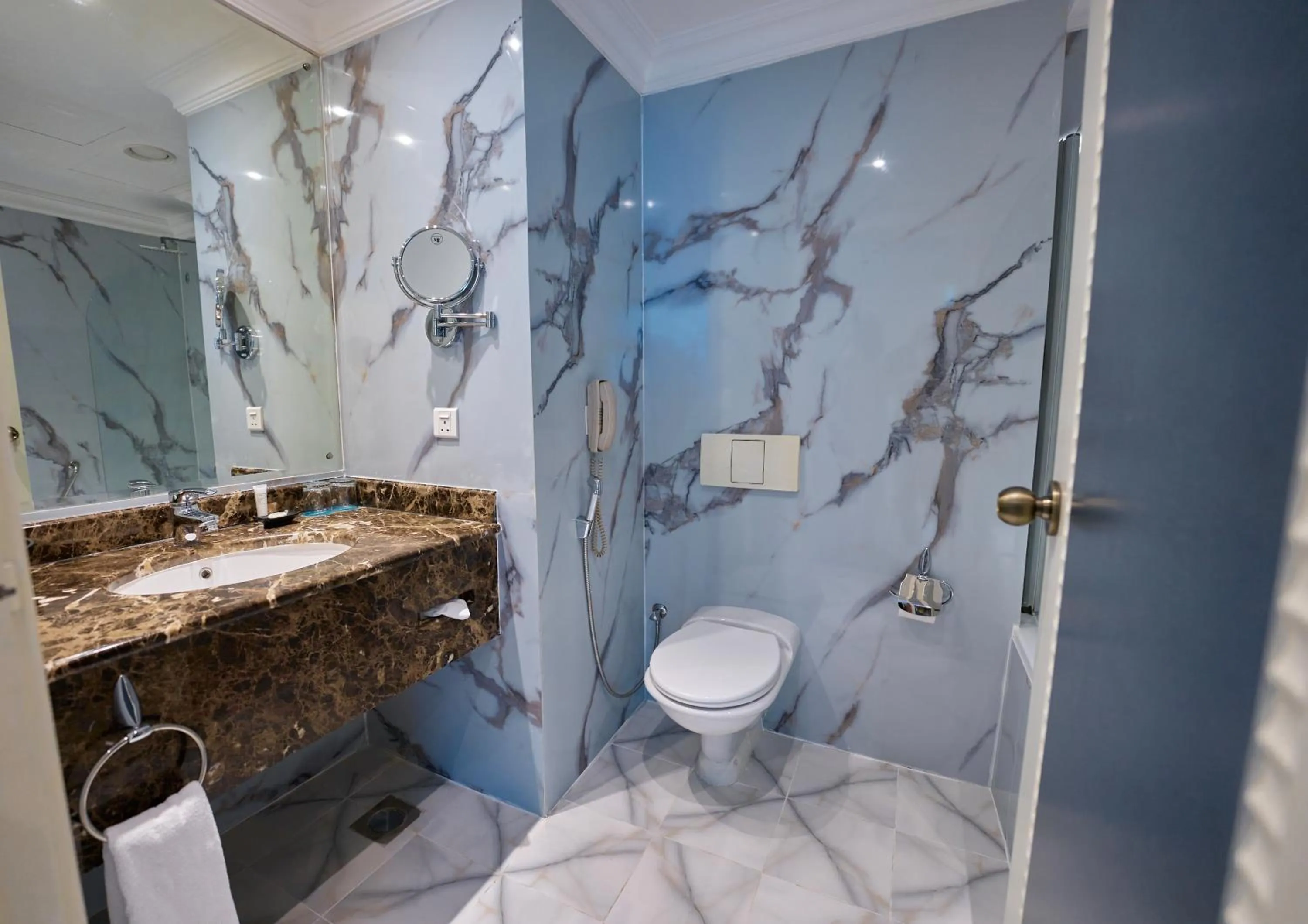 Toilet in Grand Regency Doha, Trademark Collection by Wyndham