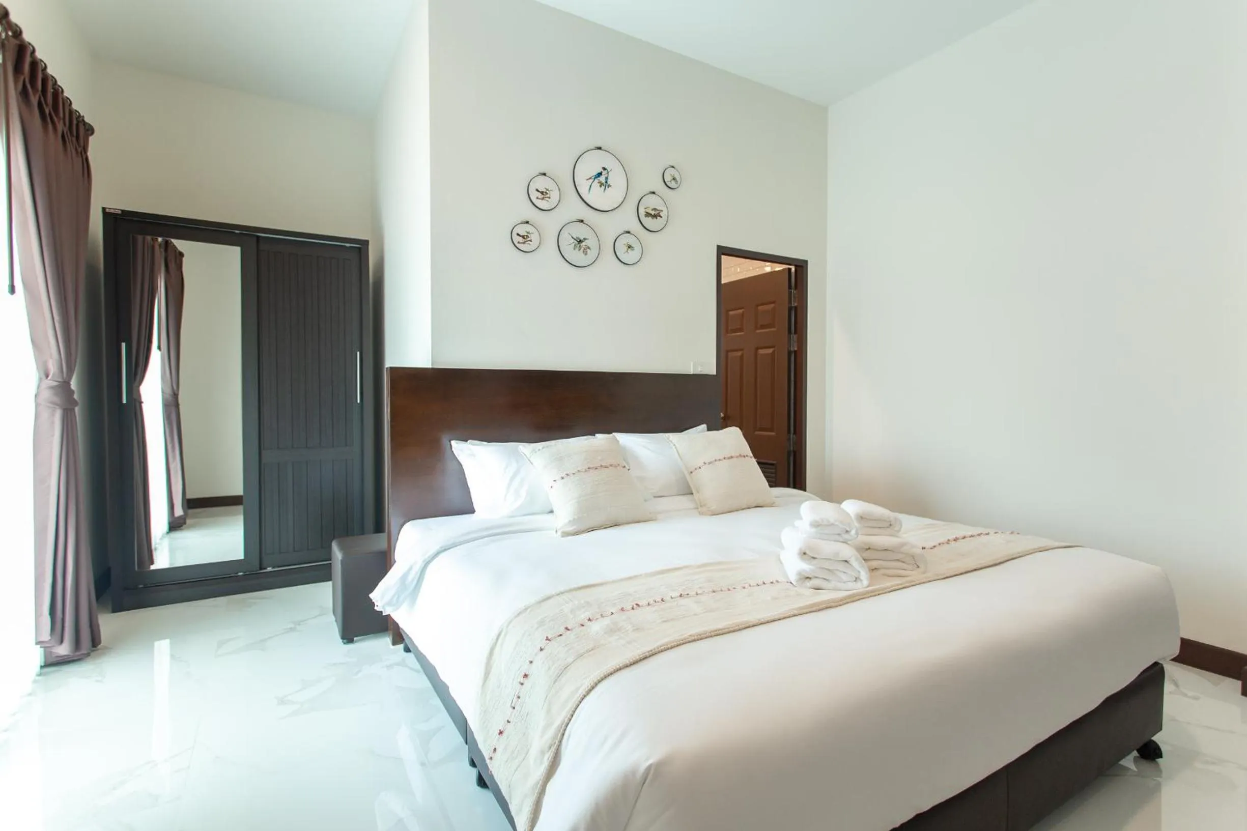 Bed in Khampare Chiang Mai Hotel