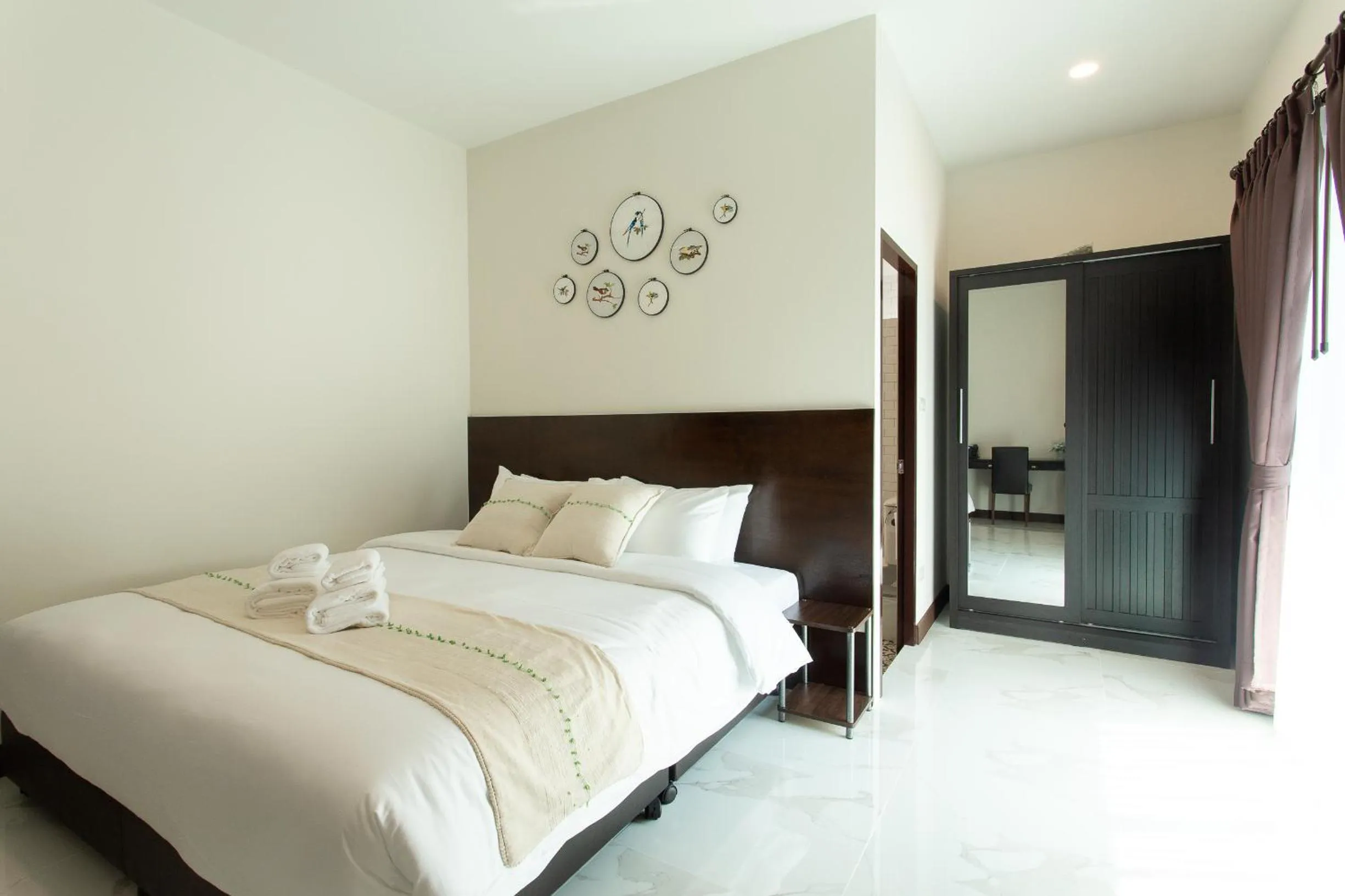 Bed in Khampare Chiang Mai Hotel