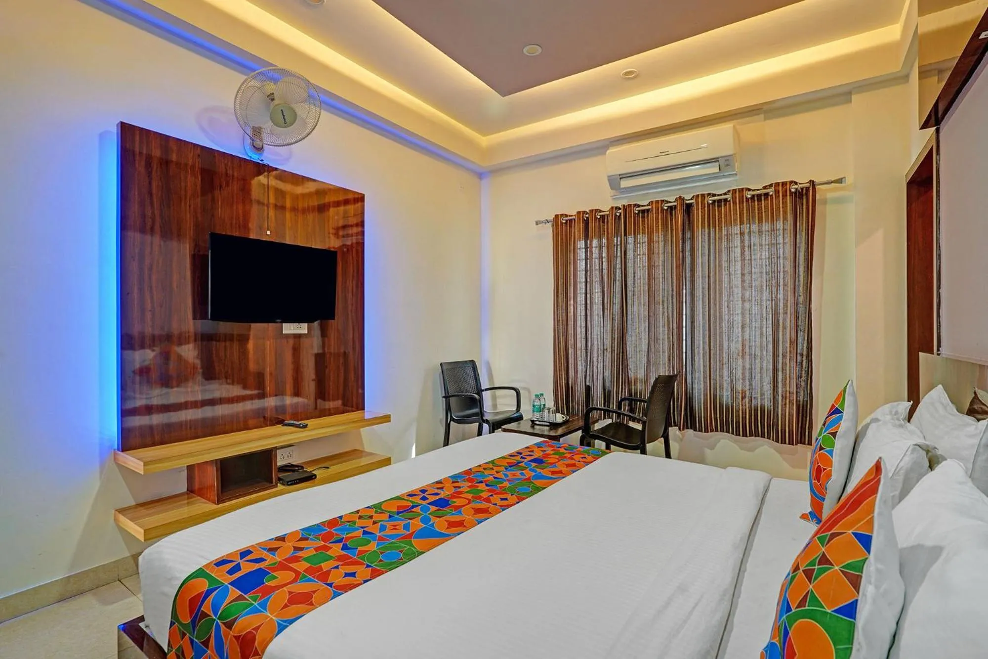 Bed in FabHotel Royal Blue Meridian Inn