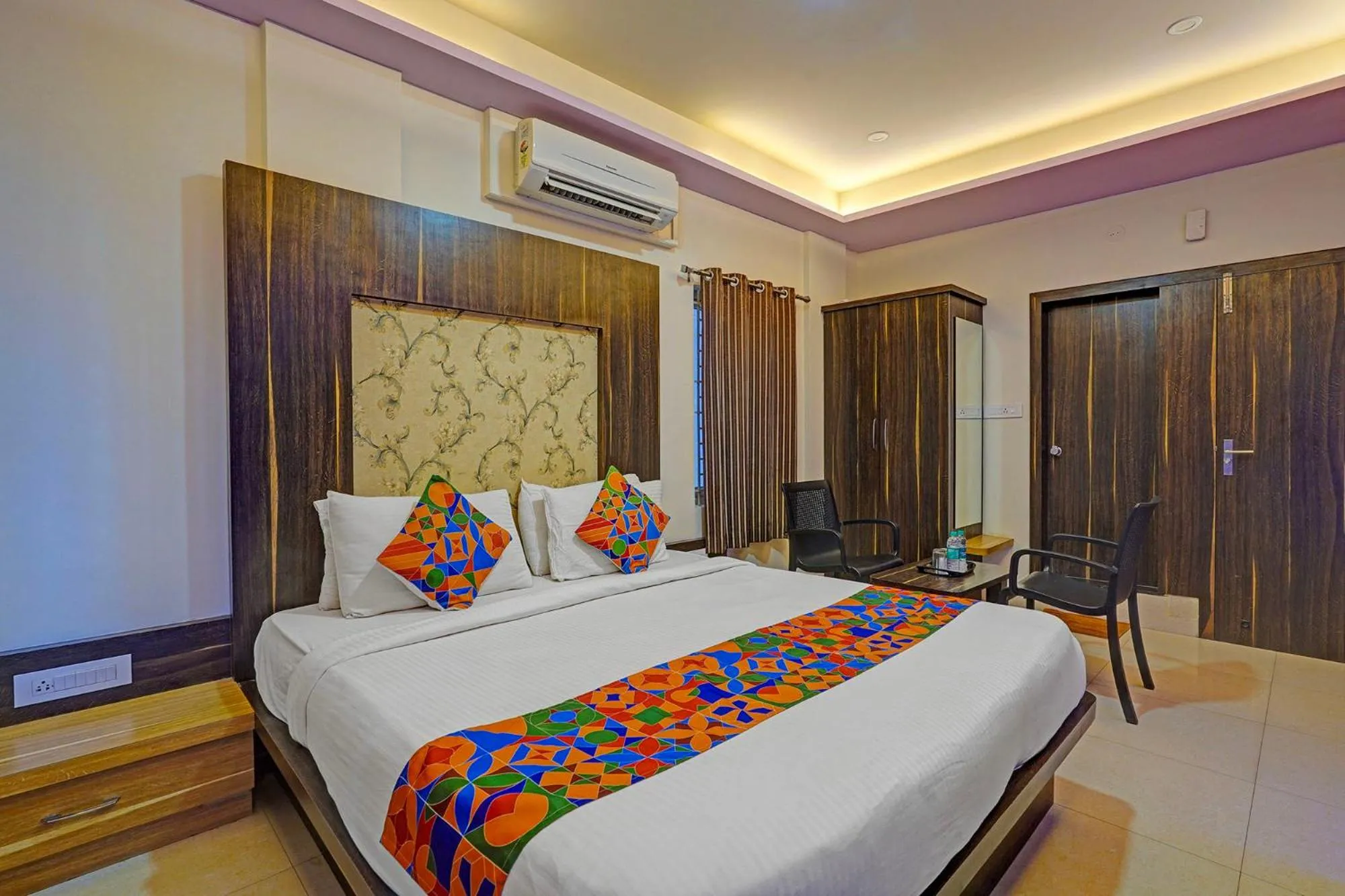 Bed in FabHotel Royal Blue Meridian Inn