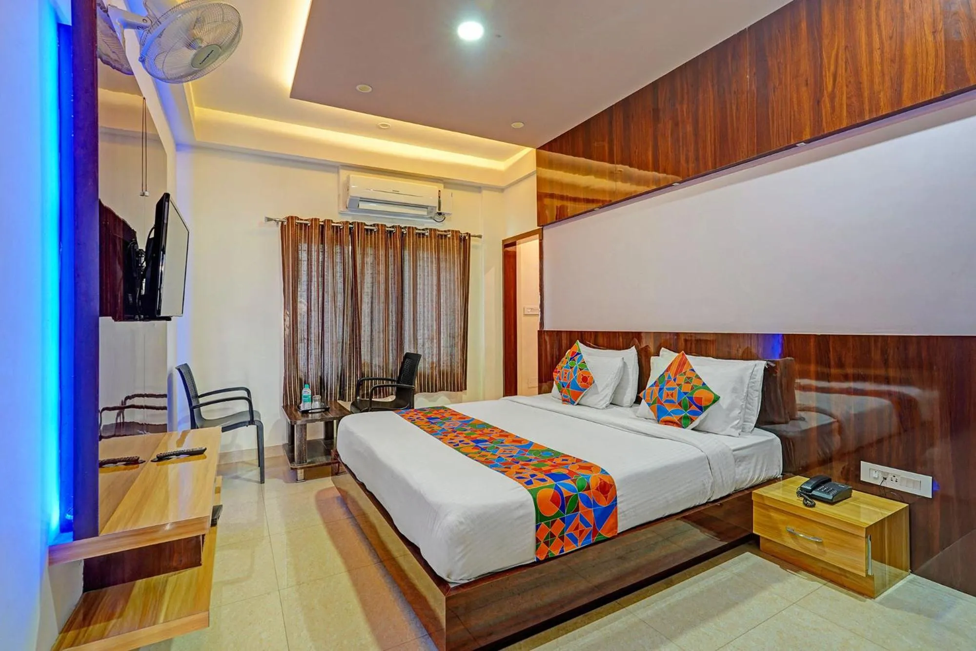 Bed in FabHotel Royal Blue Meridian Inn