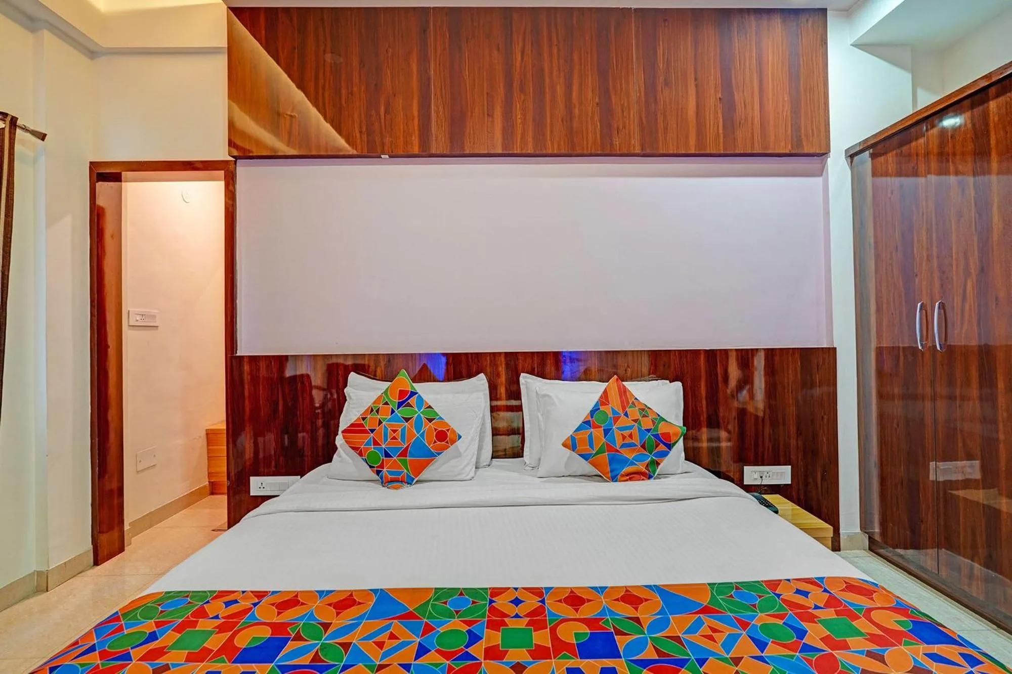 Bed in FabHotel Royal Blue Meridian Inn