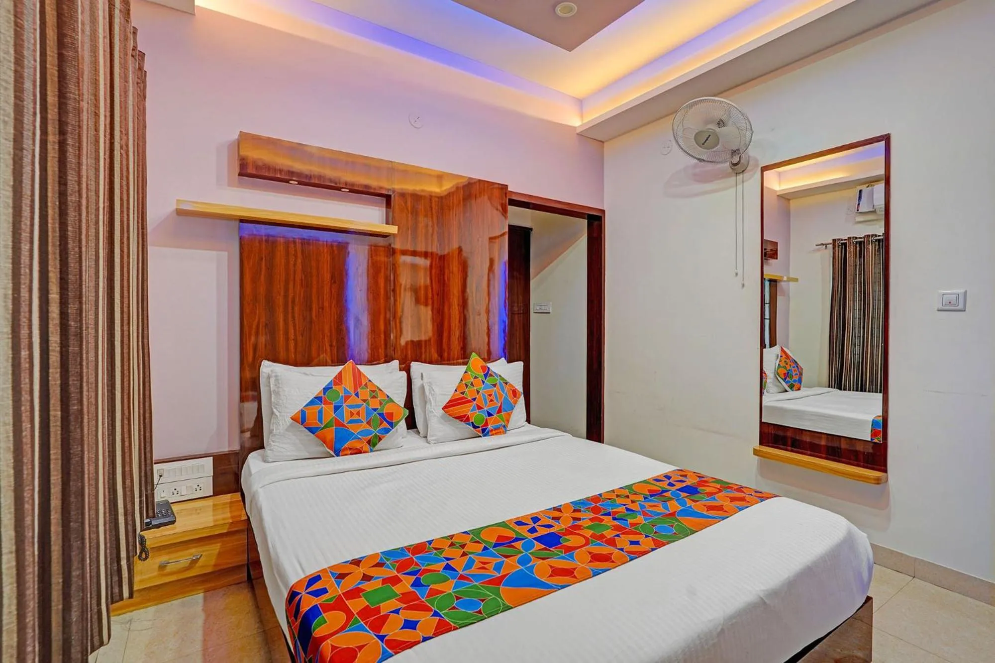 Bed in FabHotel Royal Blue Meridian Inn