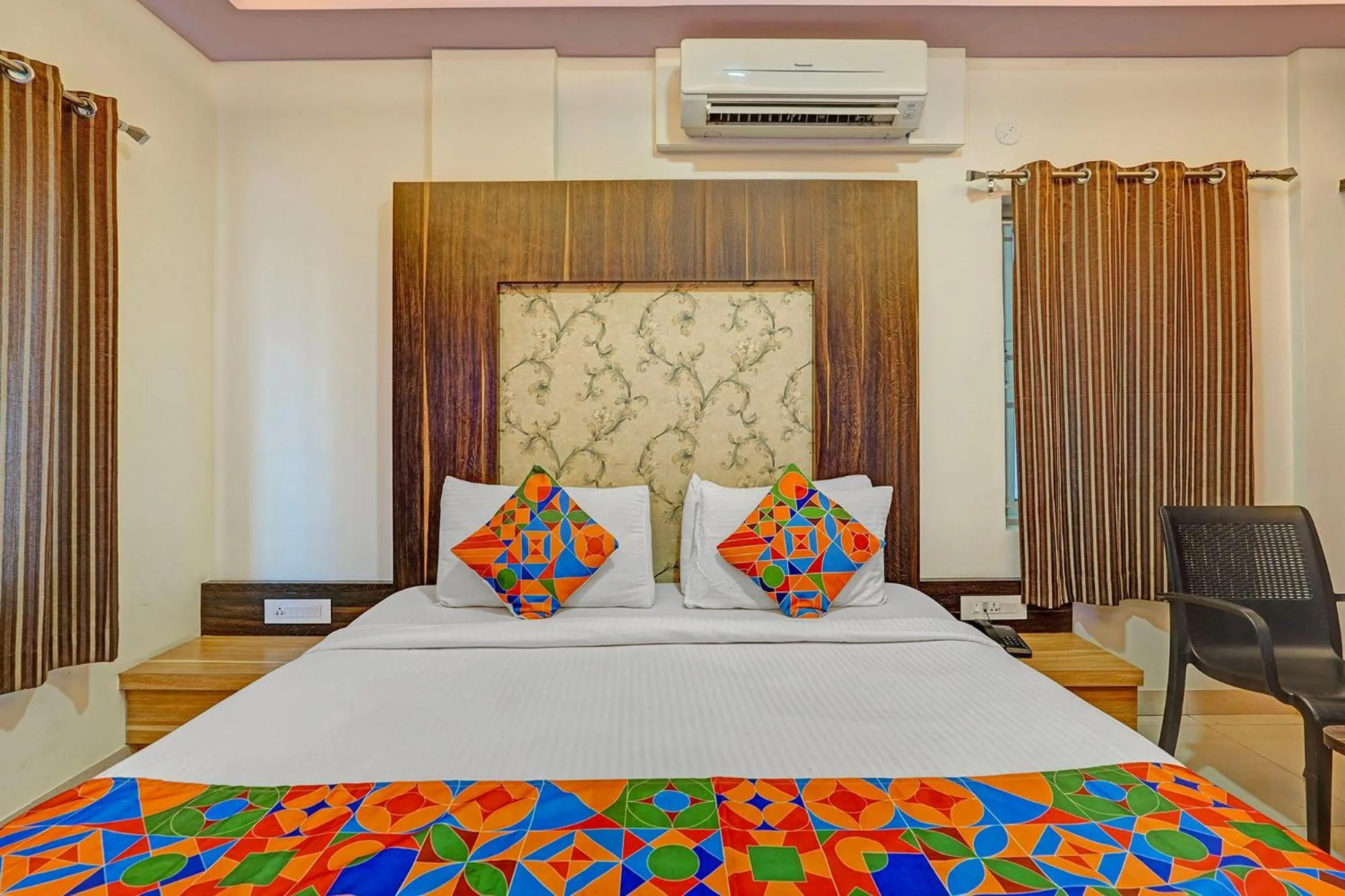 Bed in FabHotel Royal Blue Meridian Inn