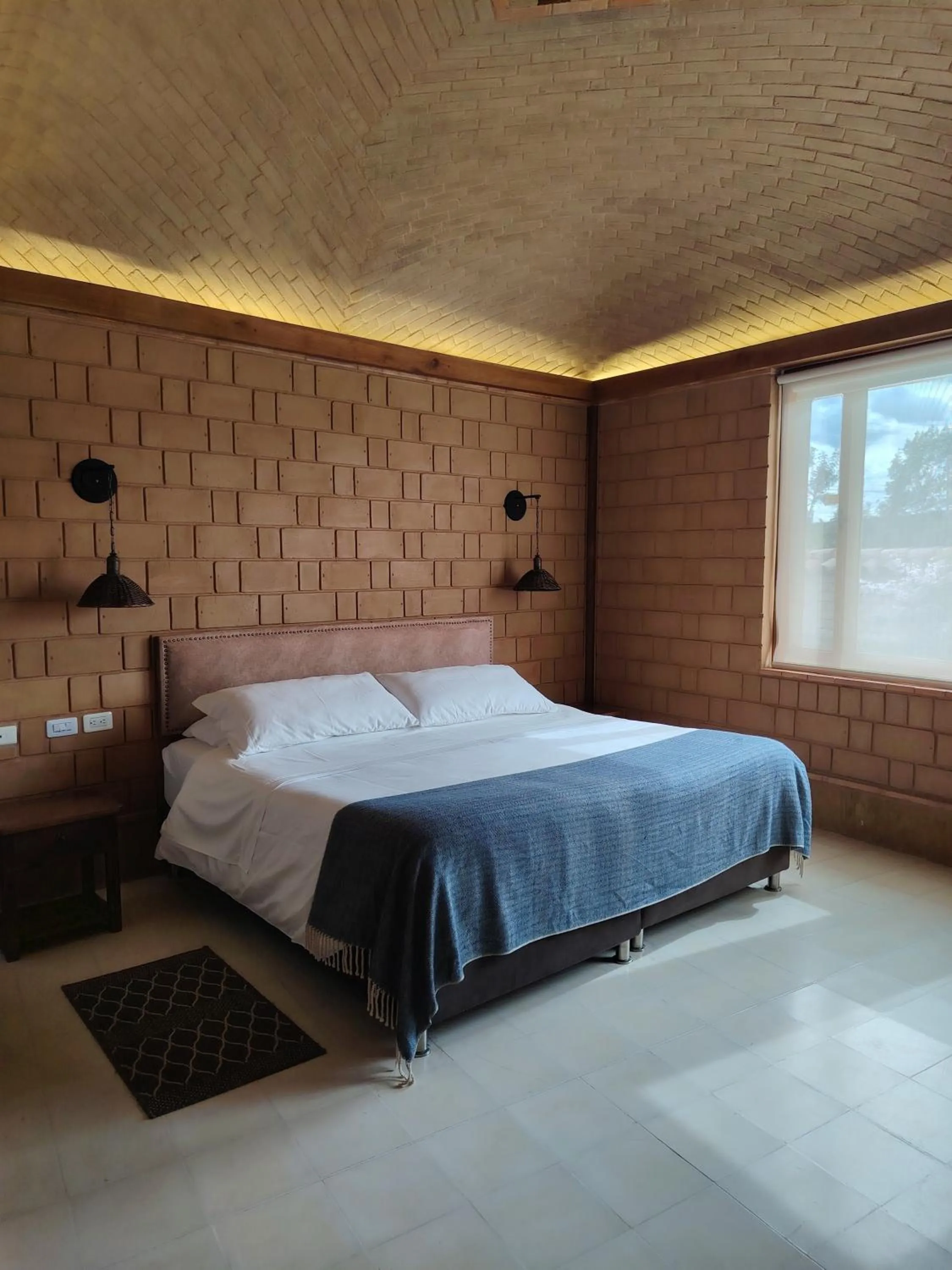 Bed in La Alhambra Hotel Boutique