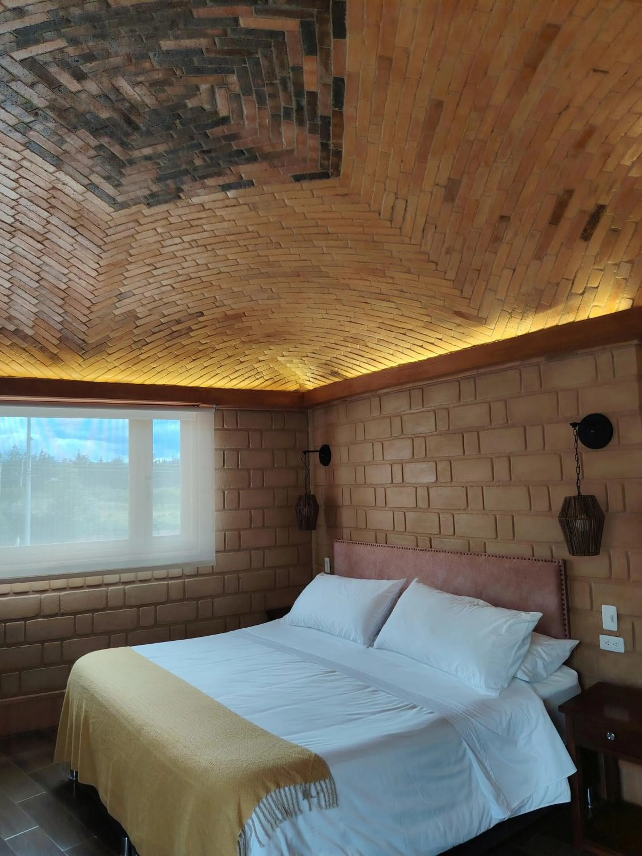 Bed in La Alhambra Hotel Boutique