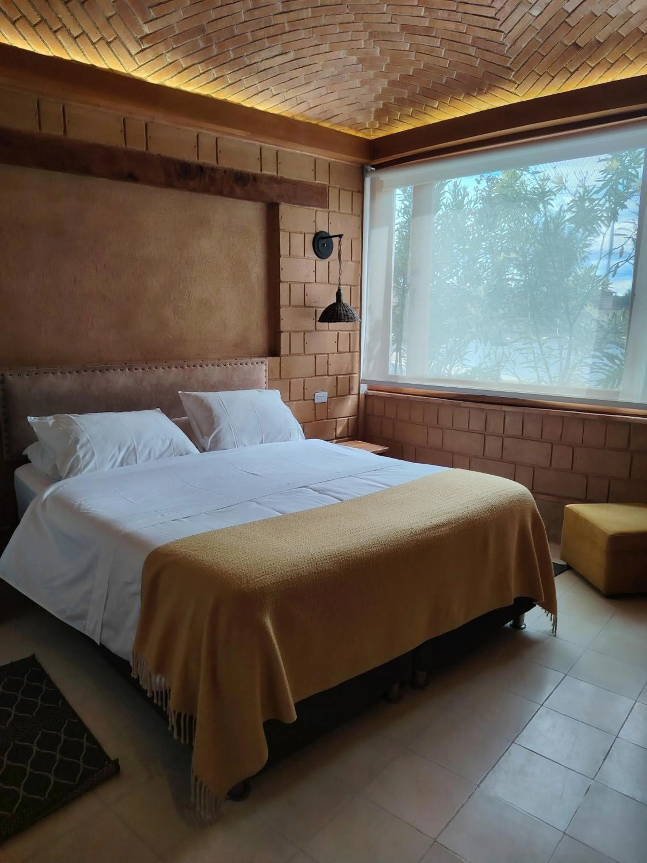 Bed in La Alhambra Hotel Boutique