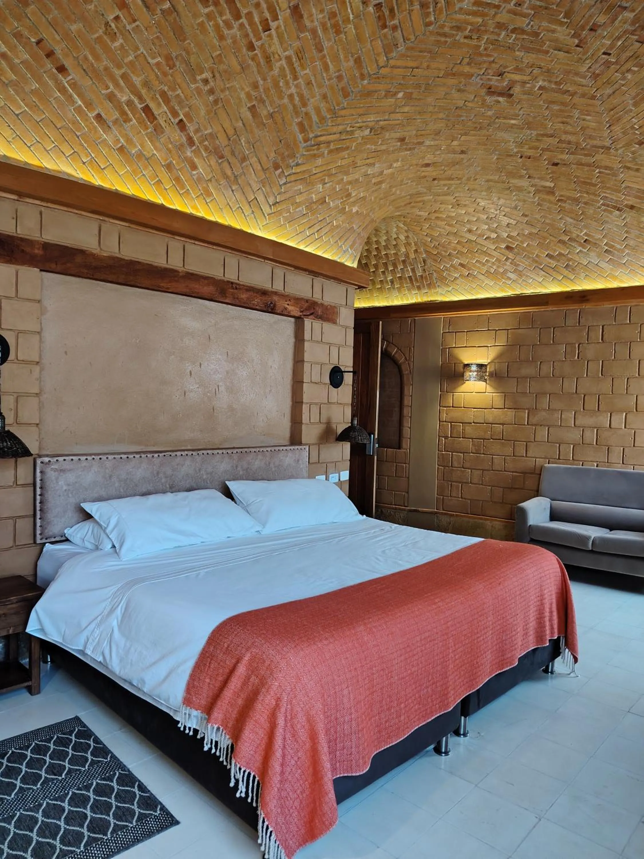 Bed in La Alhambra Hotel Boutique