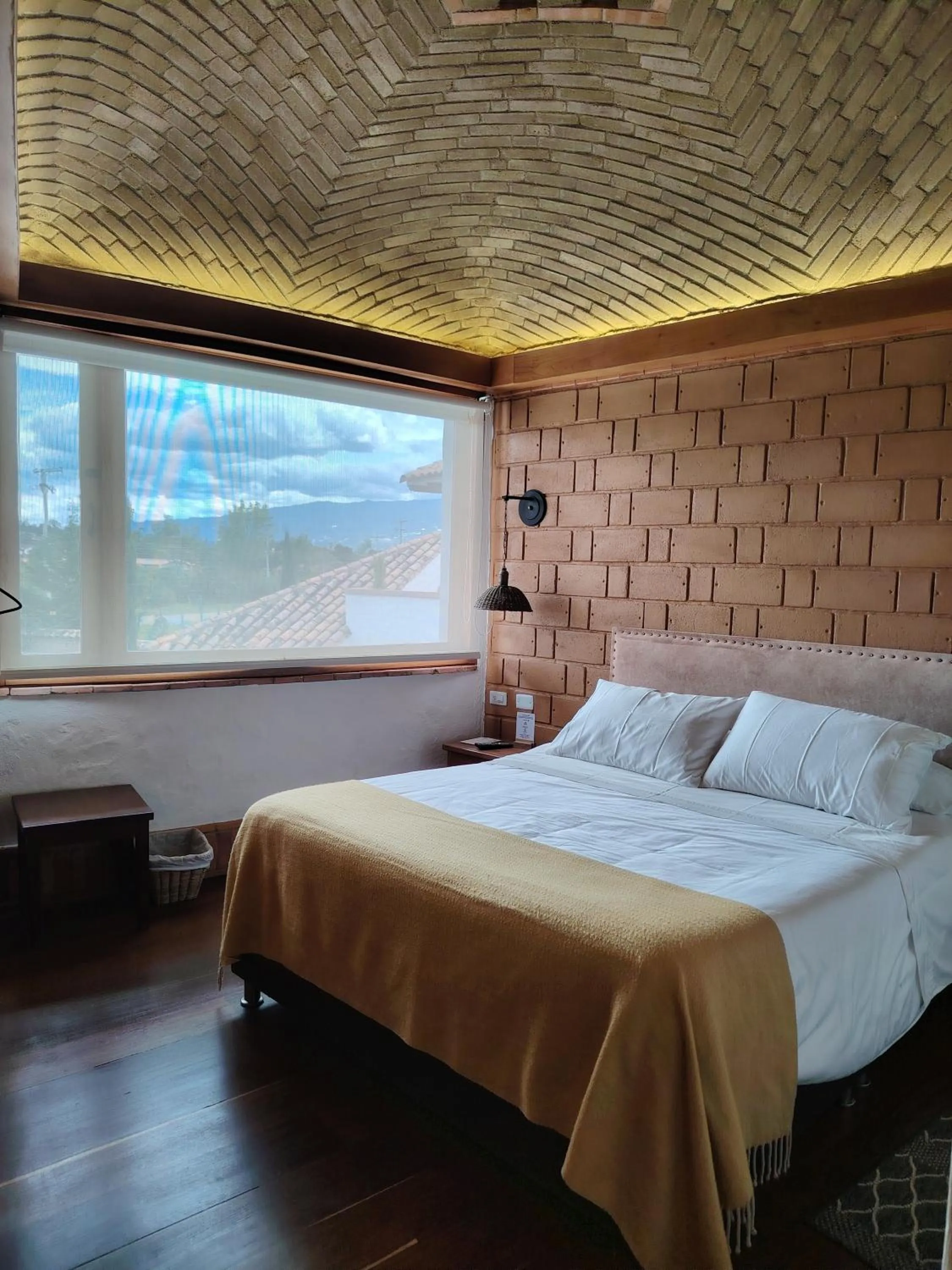 Bed in La Alhambra Hotel Boutique