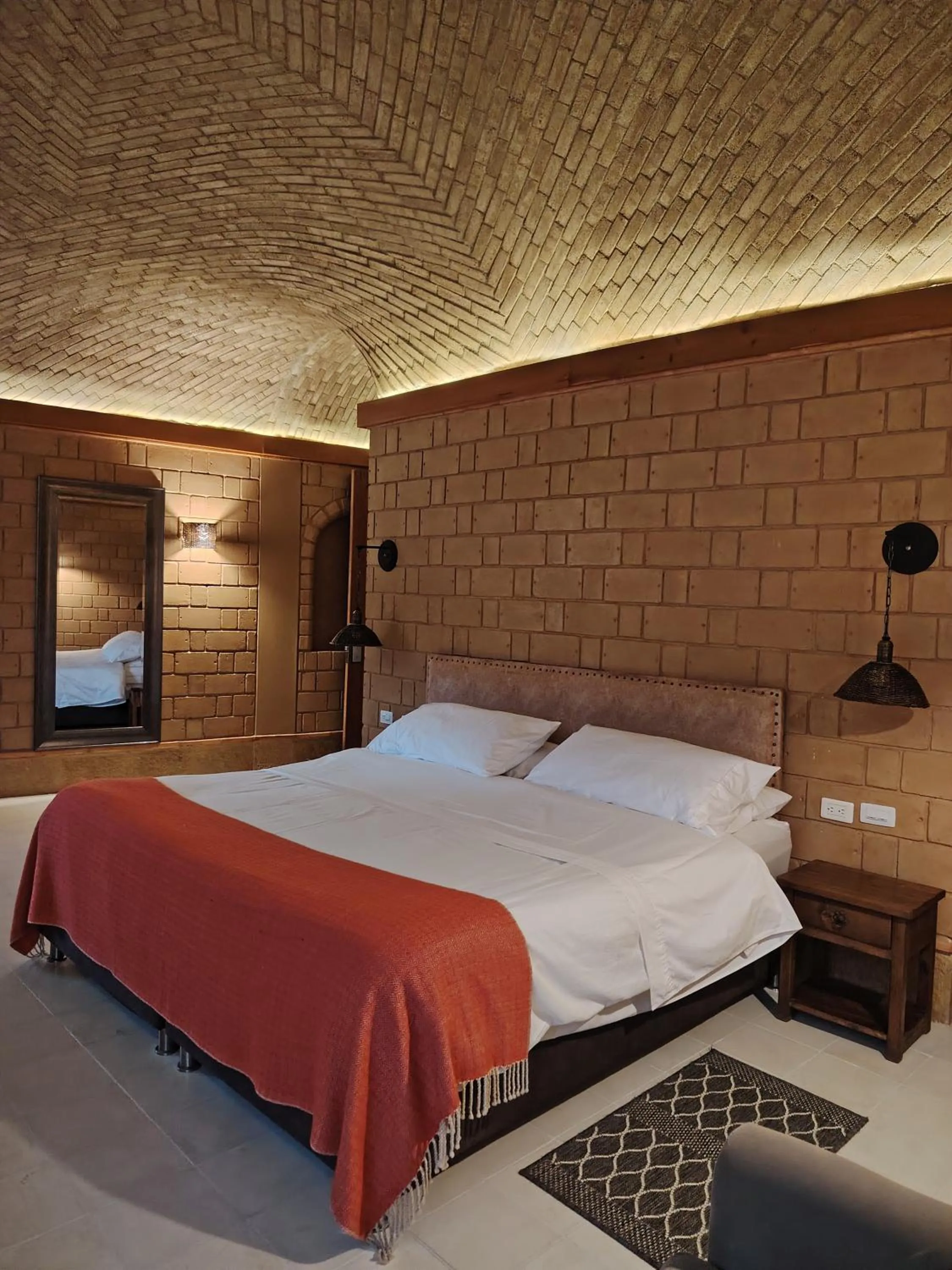 Bed in La Alhambra Hotel Boutique