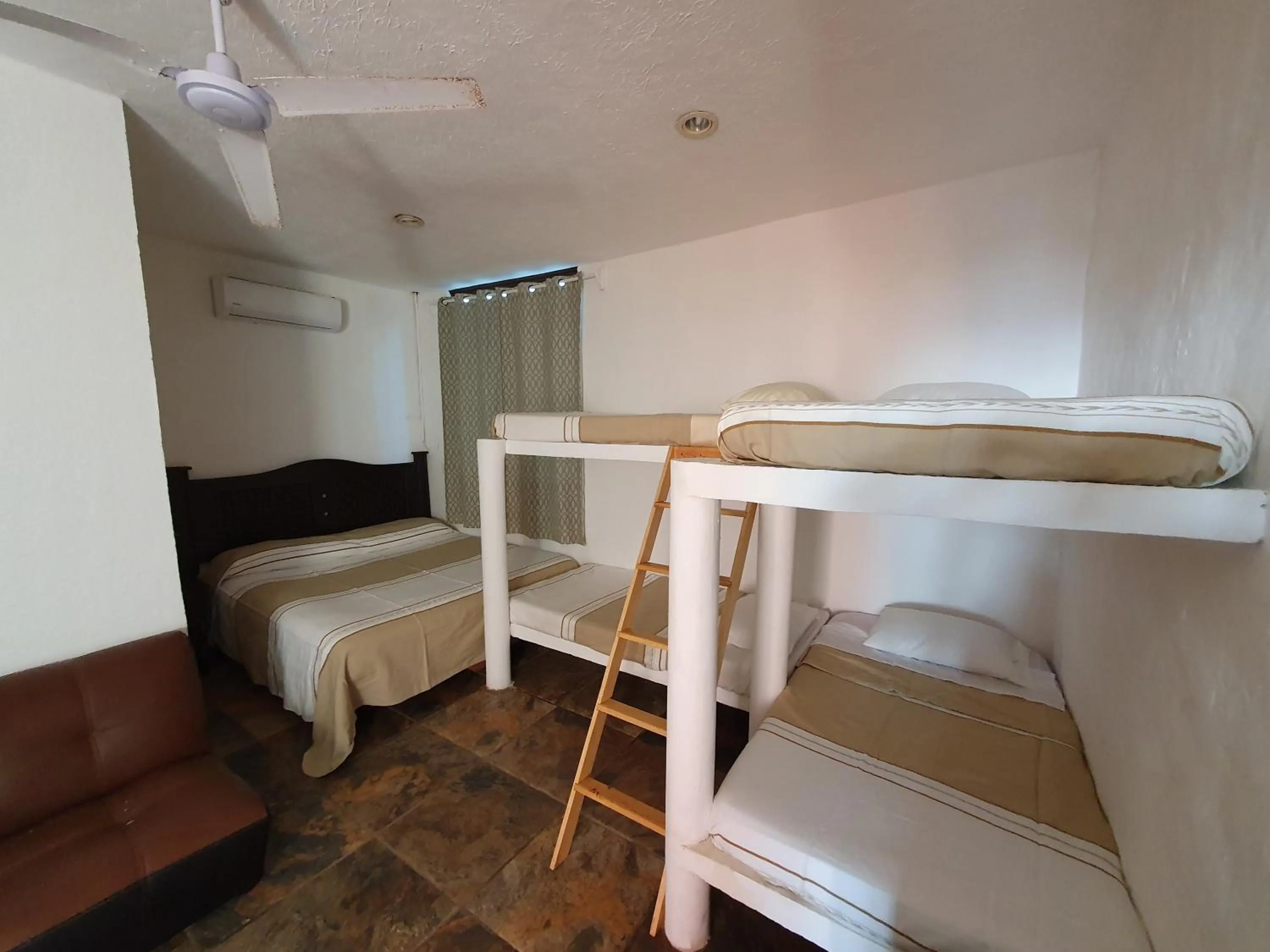 Bed in Bungalows La Perla Playa Azul