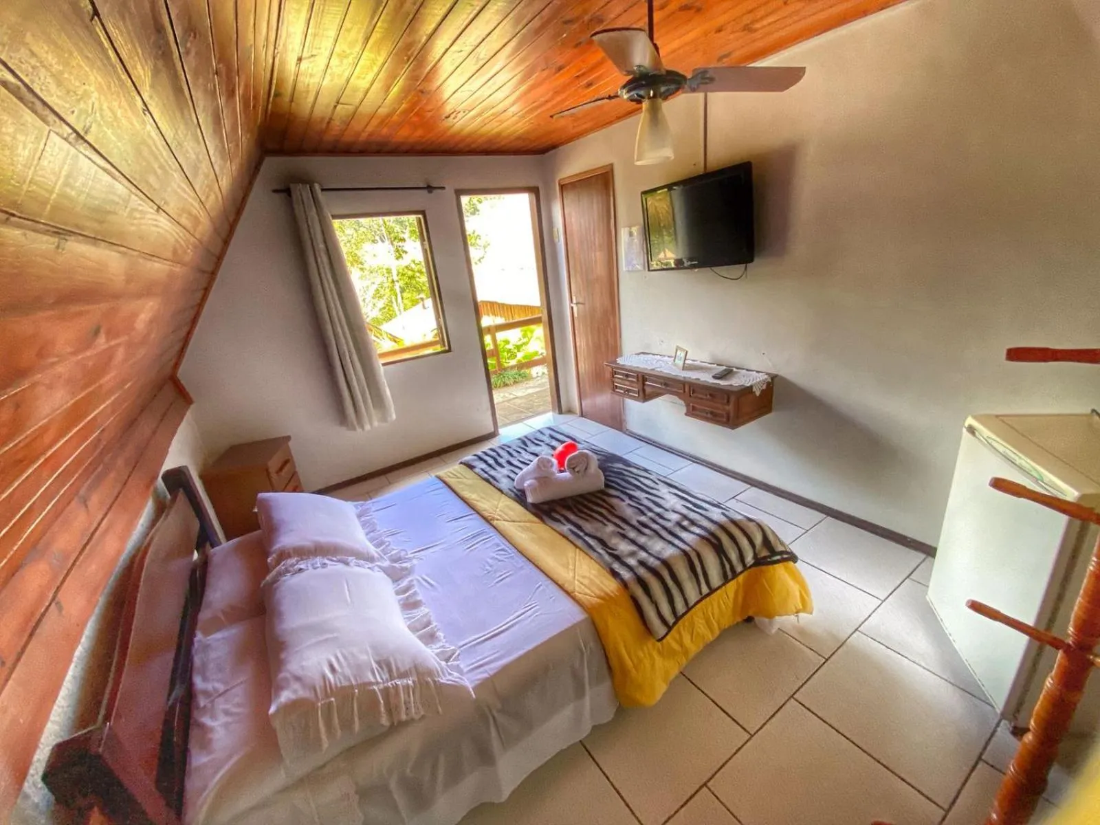 Bed in Pousada Colibri Serrano