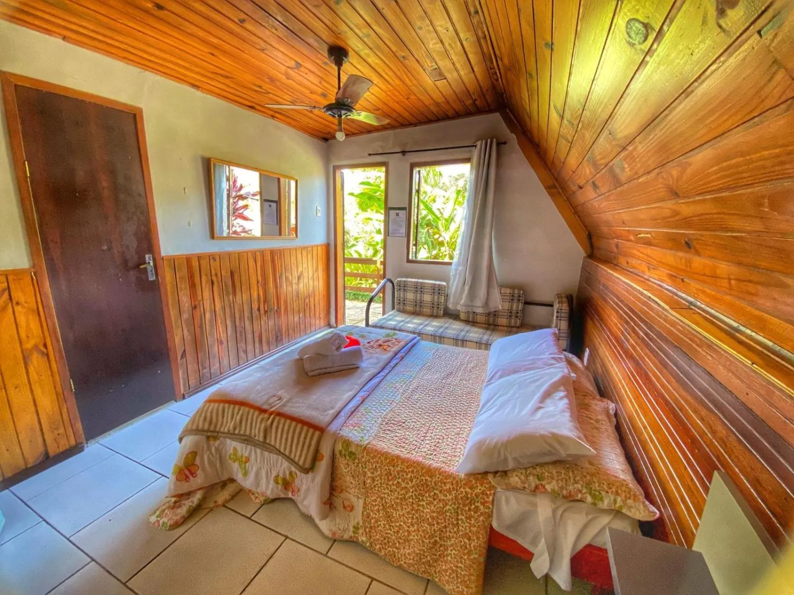 Bed in Pousada Colibri Serrano