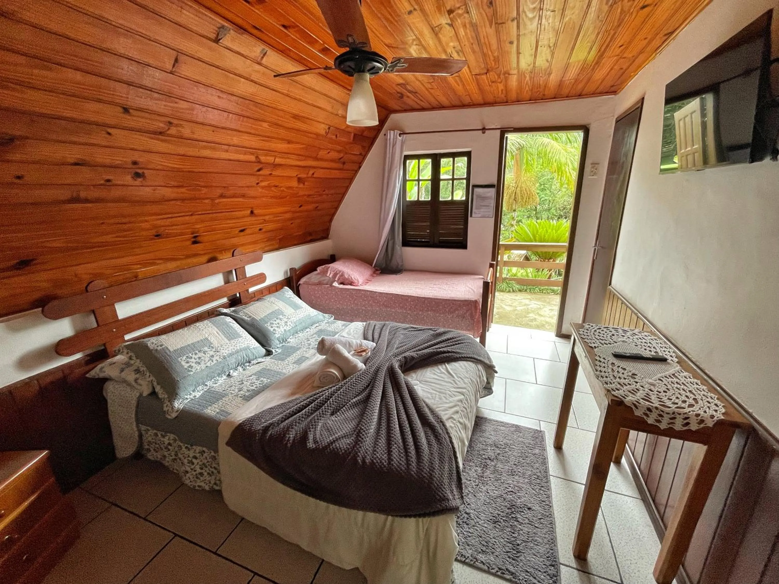 Bed in Pousada Colibri Serrano