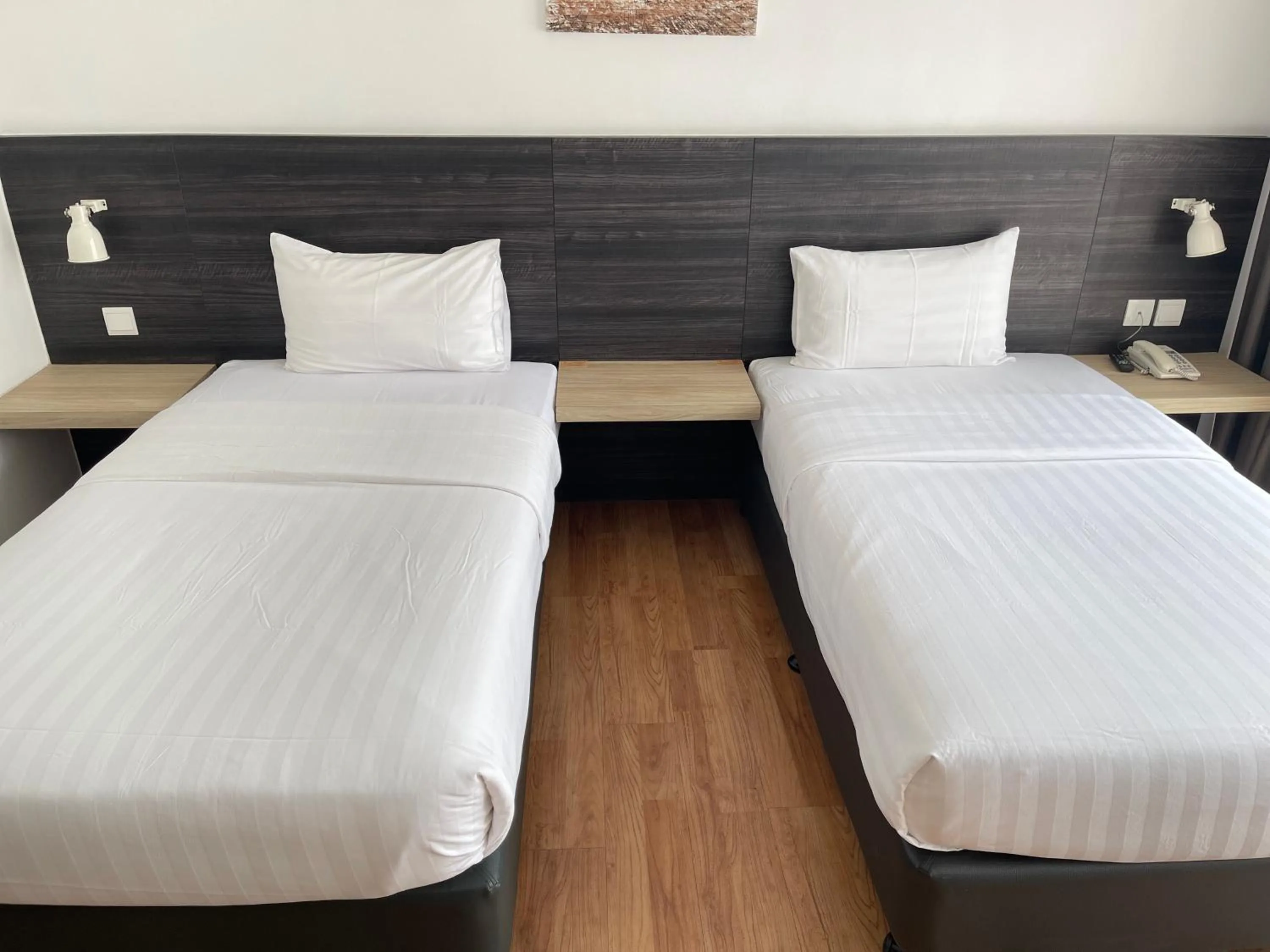 Bed in Win Hotel