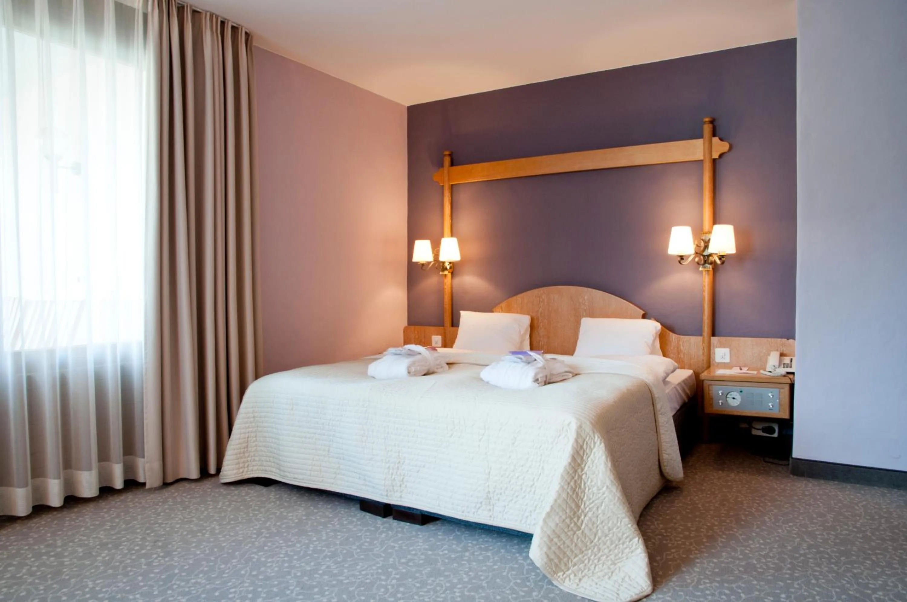 Bed in Hotel Rosatsch