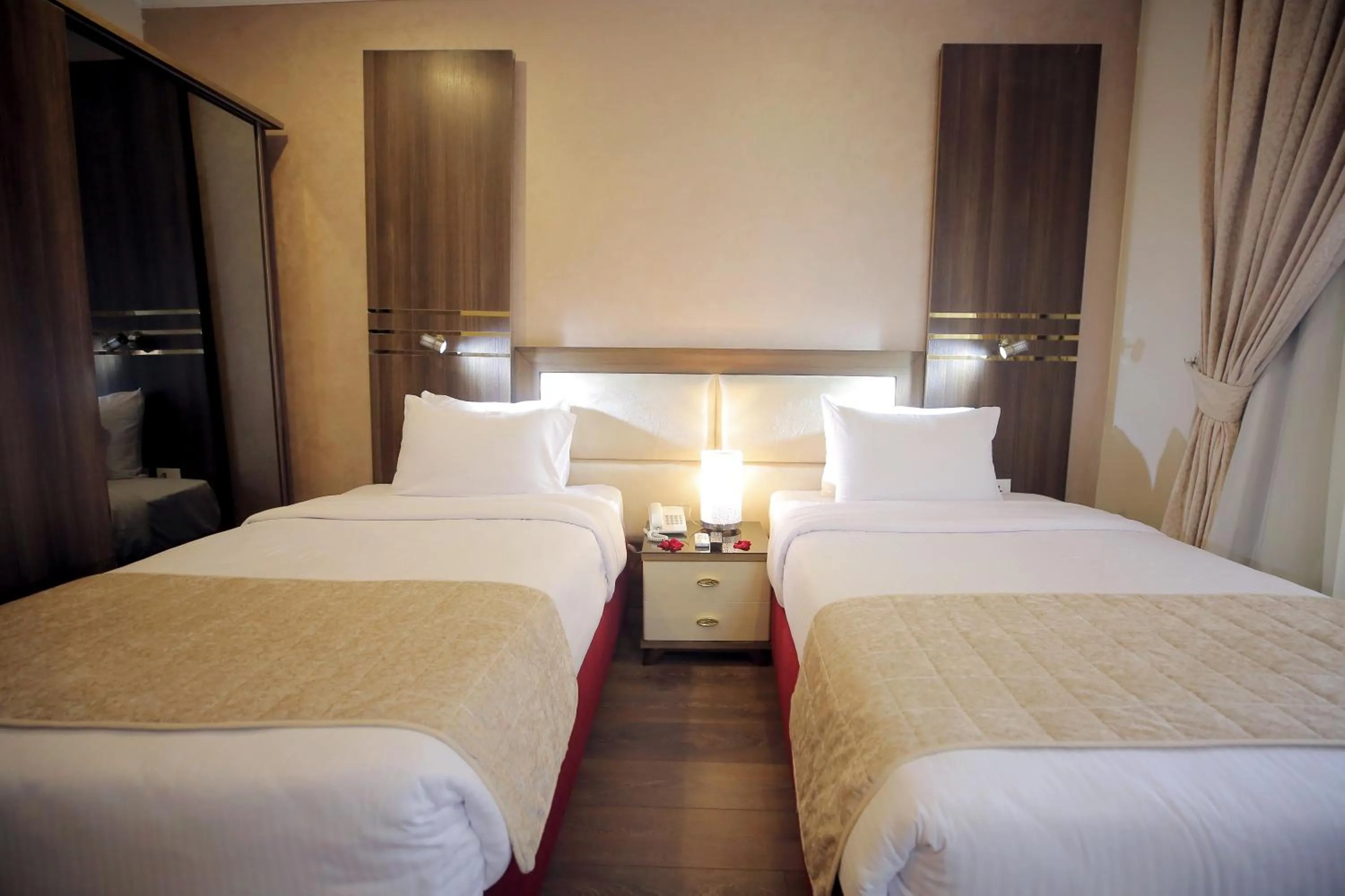 Bed in Cairo Taj Hotels & Suites - Dokki