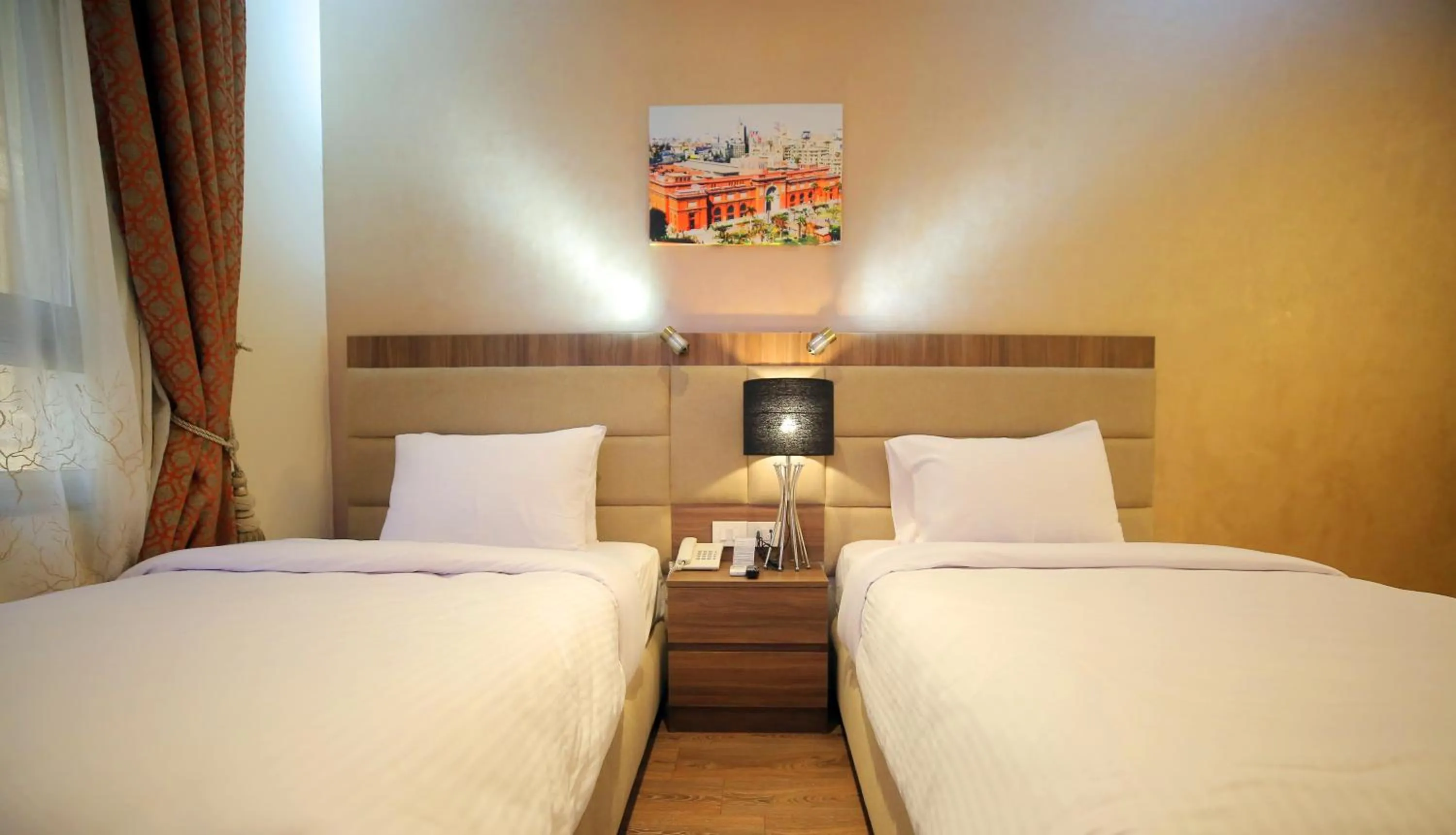 Bed in Cairo Taj Hotels & Suites - Dokki